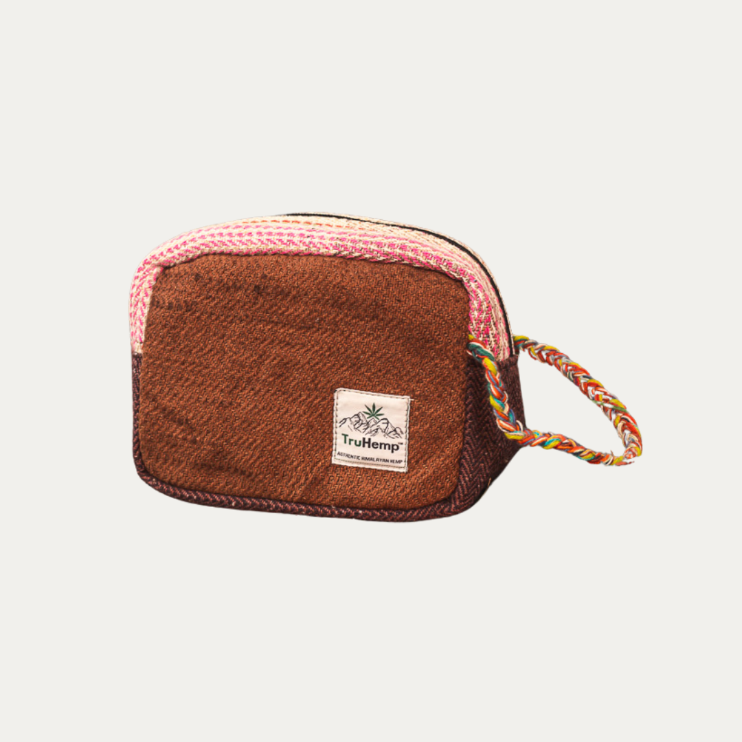 Eco-friendly Himalayan Hemp Toiletry Kit, featuring a brown hemp pouch with colorful trim and a convenient carrying handle.