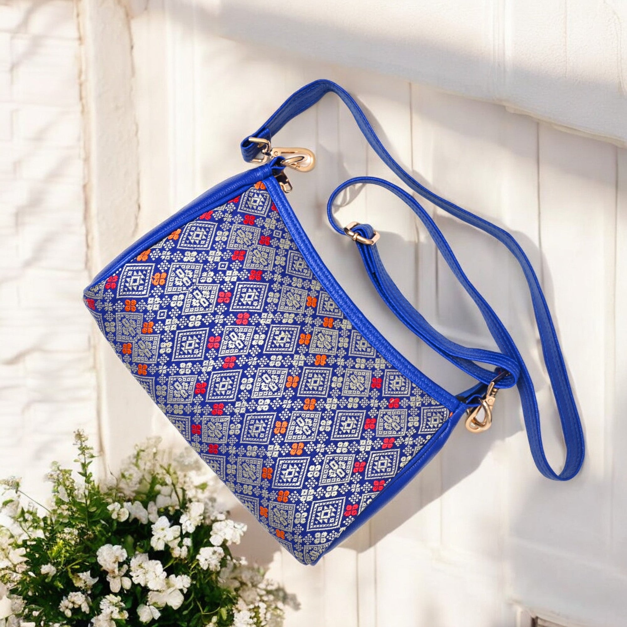 The Clossy Blue Sling Bag