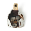 Stylish brown and white top grain leather coin pouch open and filled with coins.