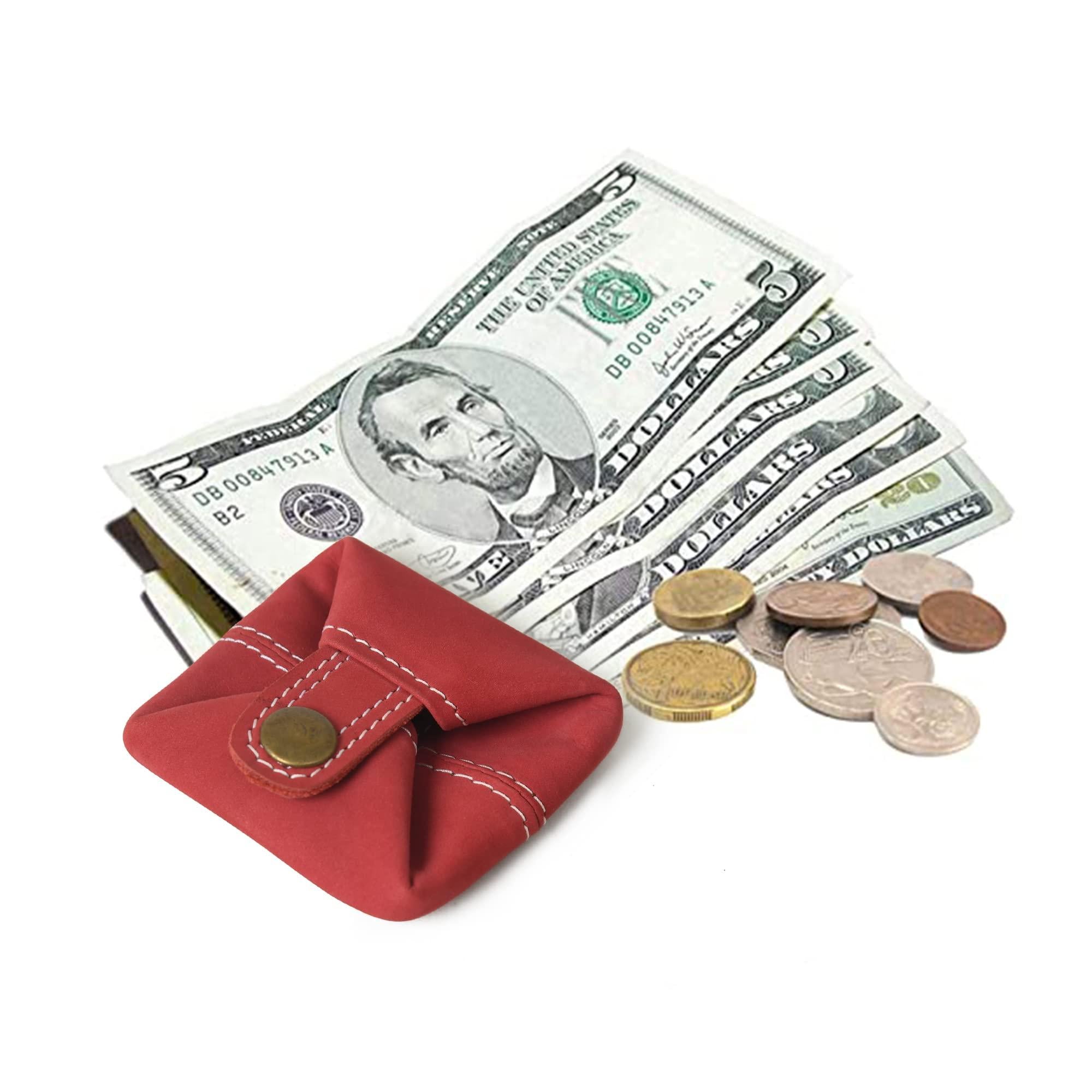 Classic red velvet leather mini coin purse with white stitching, shown holding cash and coins.