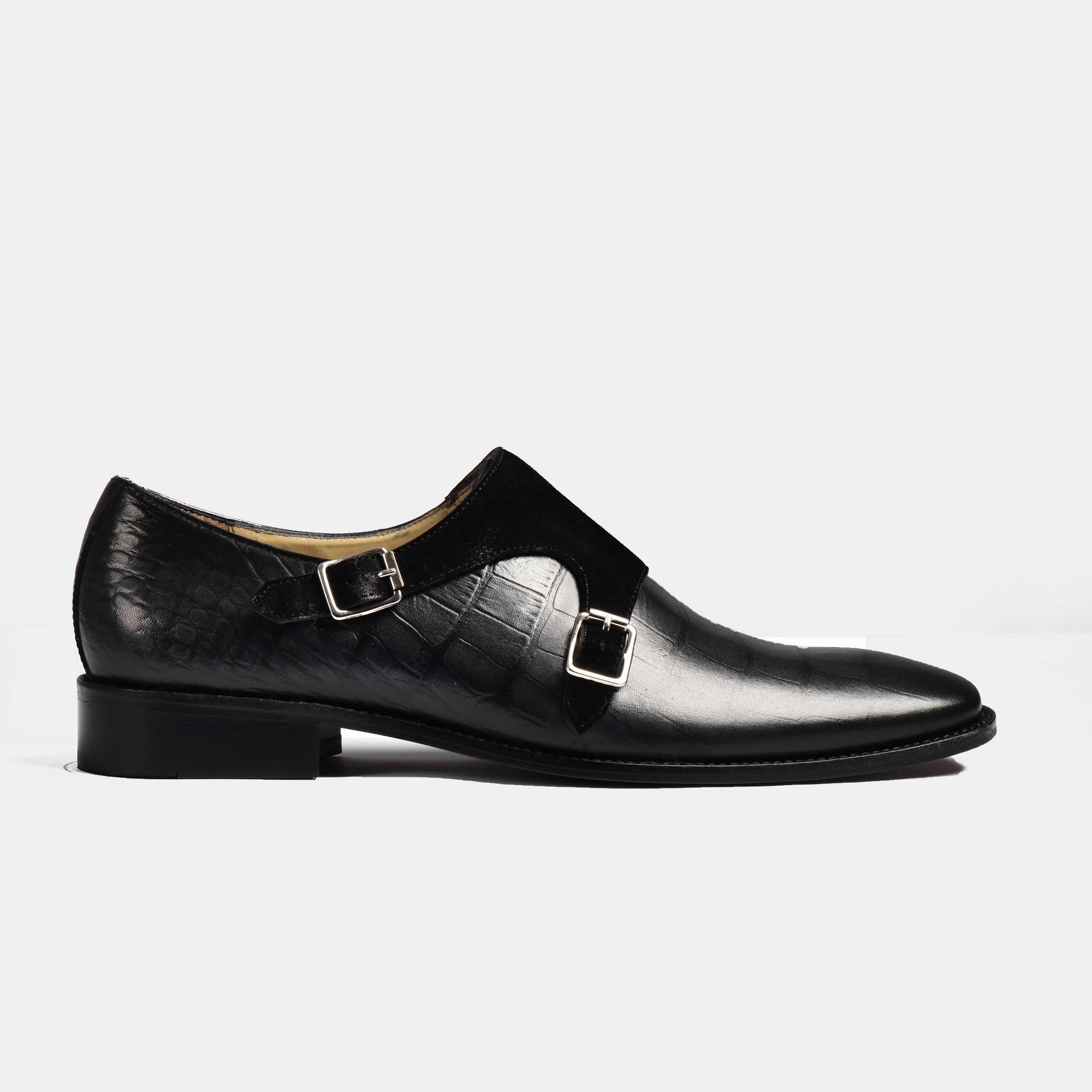 A pair of black Nathan Roy Leather Monk Straps with silver buckles on a white background.