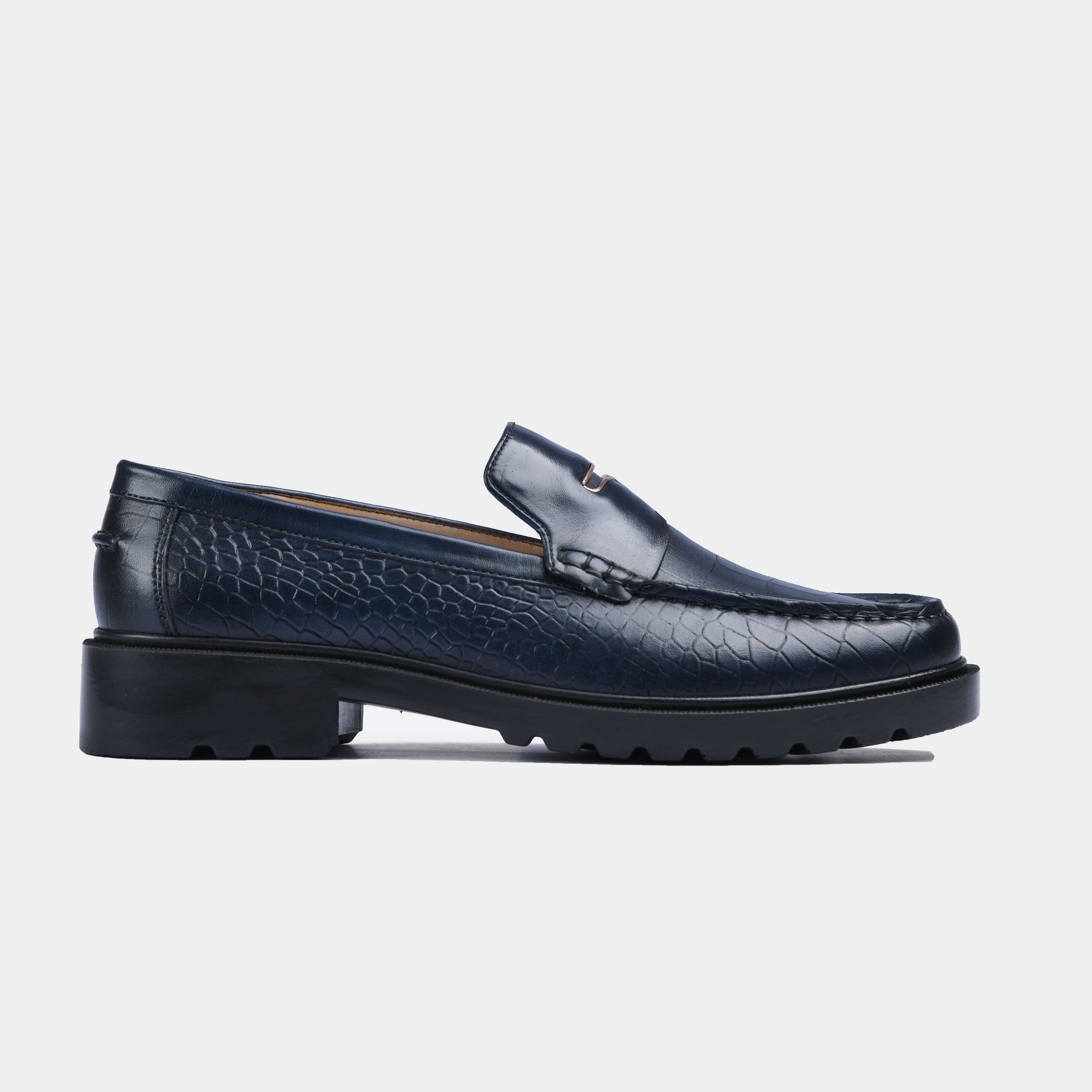 Pair of navy blue croc-embossed leather loafers with Solesculpt Lite technology for a comfortable and stylish fit.