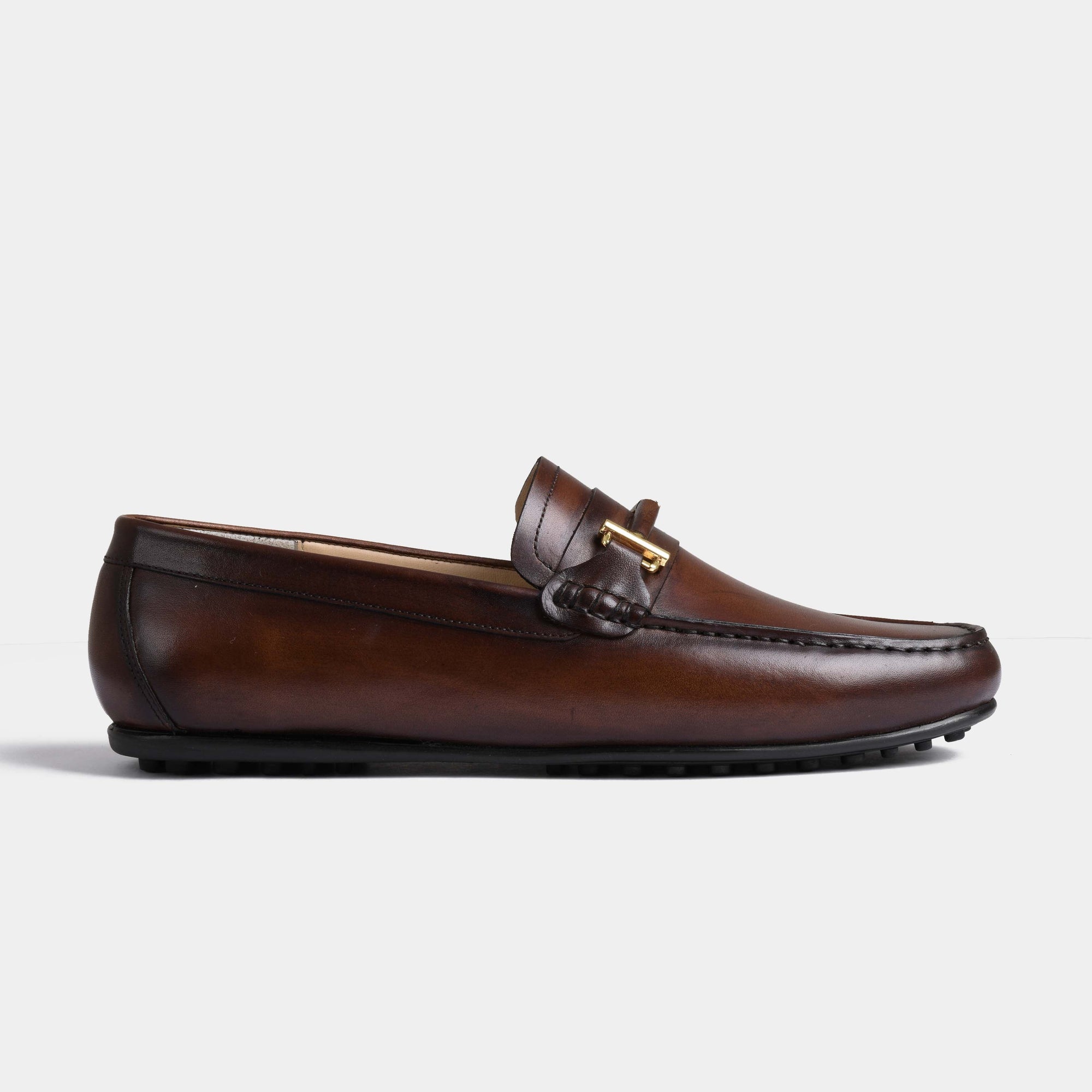 Pair of Diablo Brown Leather Driving Loafers with a gold buckle detail.