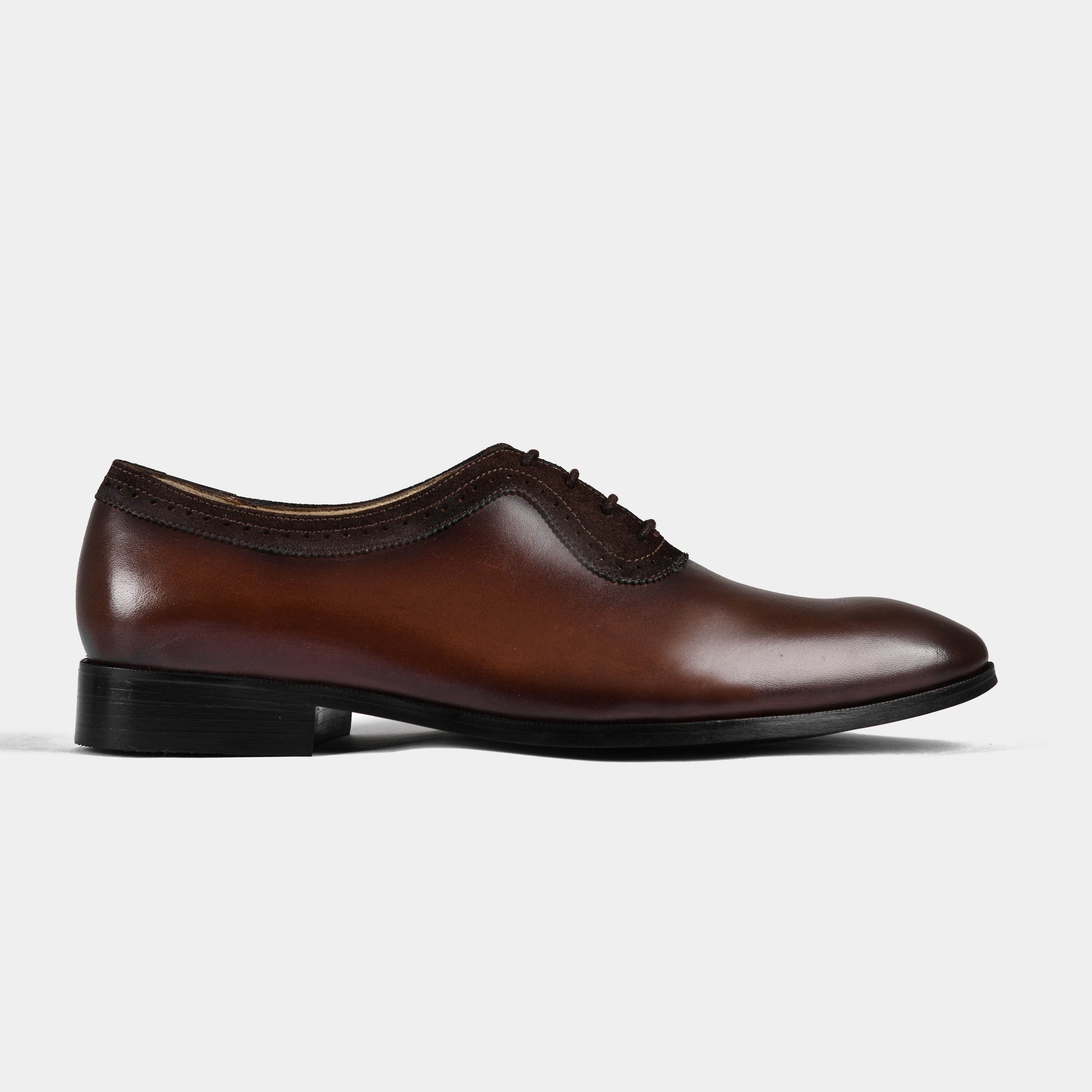 Pair of Orlan Brown Leather Laceups, a classic men's dress shoe with elegant broguing detail.