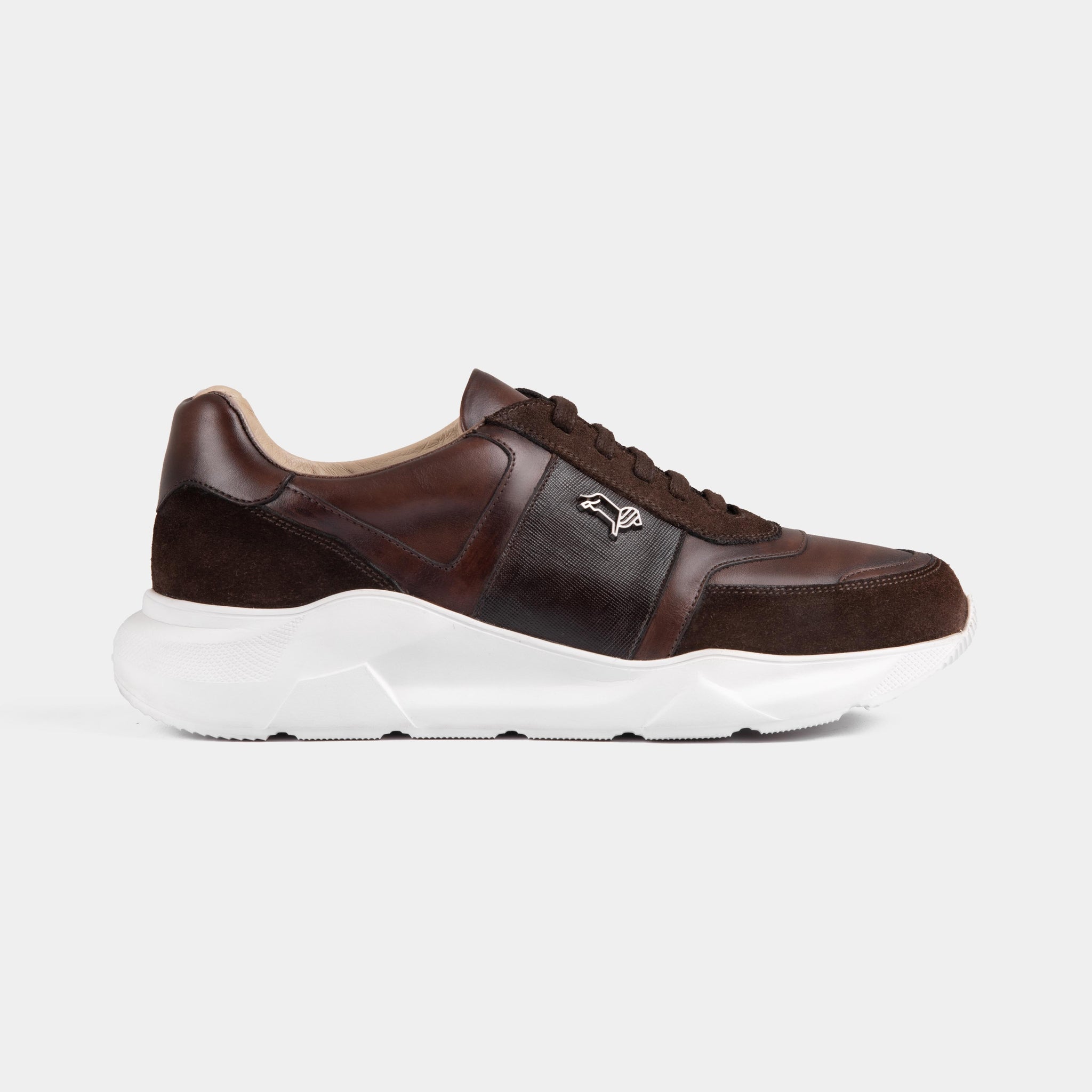 Aureo Brown leather sneakers with a white sole.