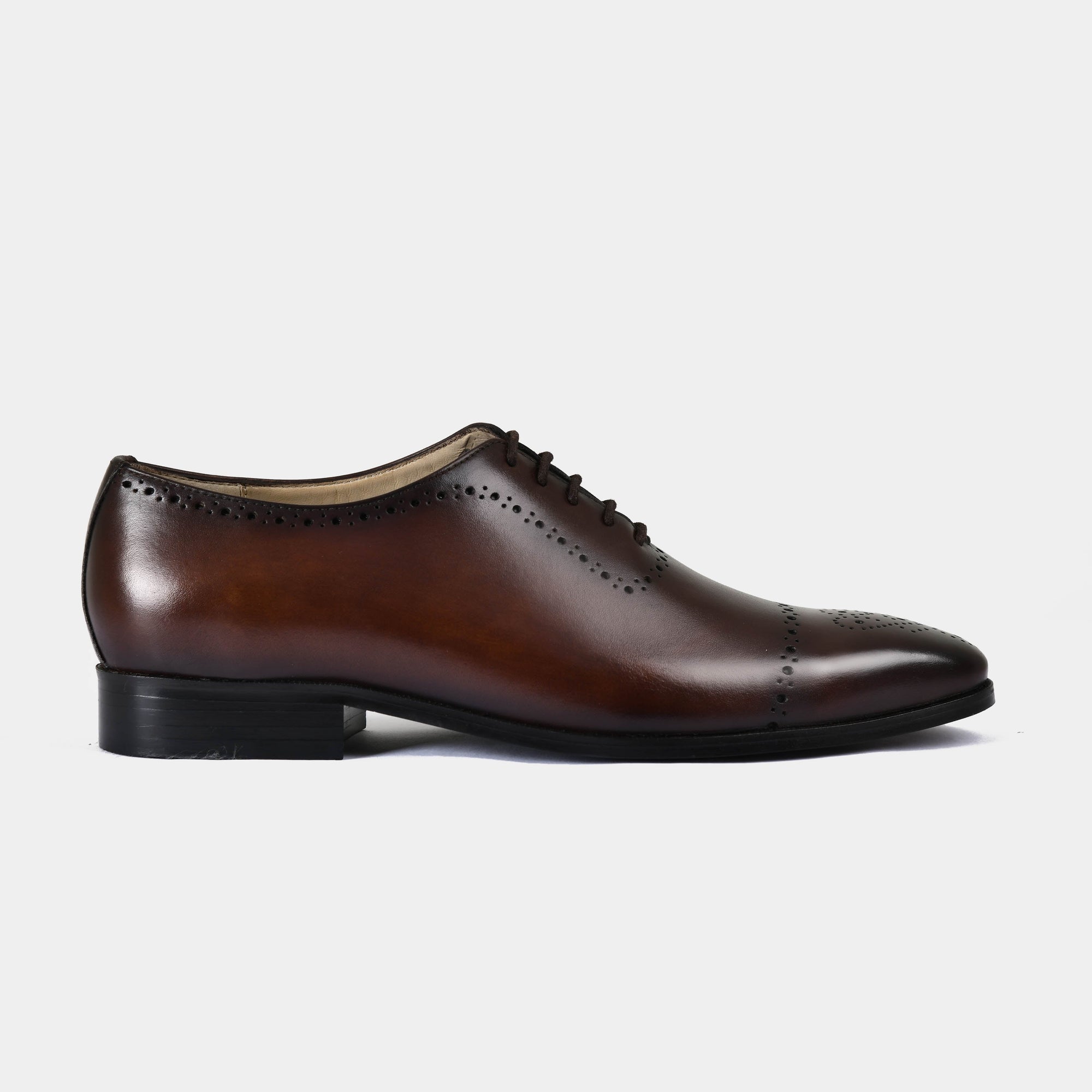 Pair of Lonzo Brown Lace Up Oxford shoes with brogue detailing.