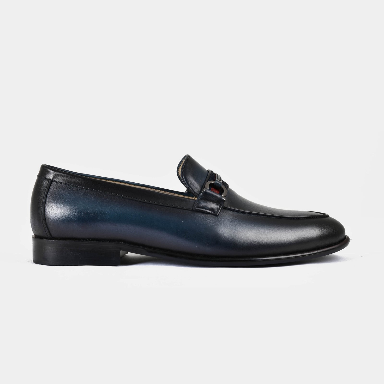 Armante blue leather loafers with a metal bit detail on the vamp, shown in a side view.