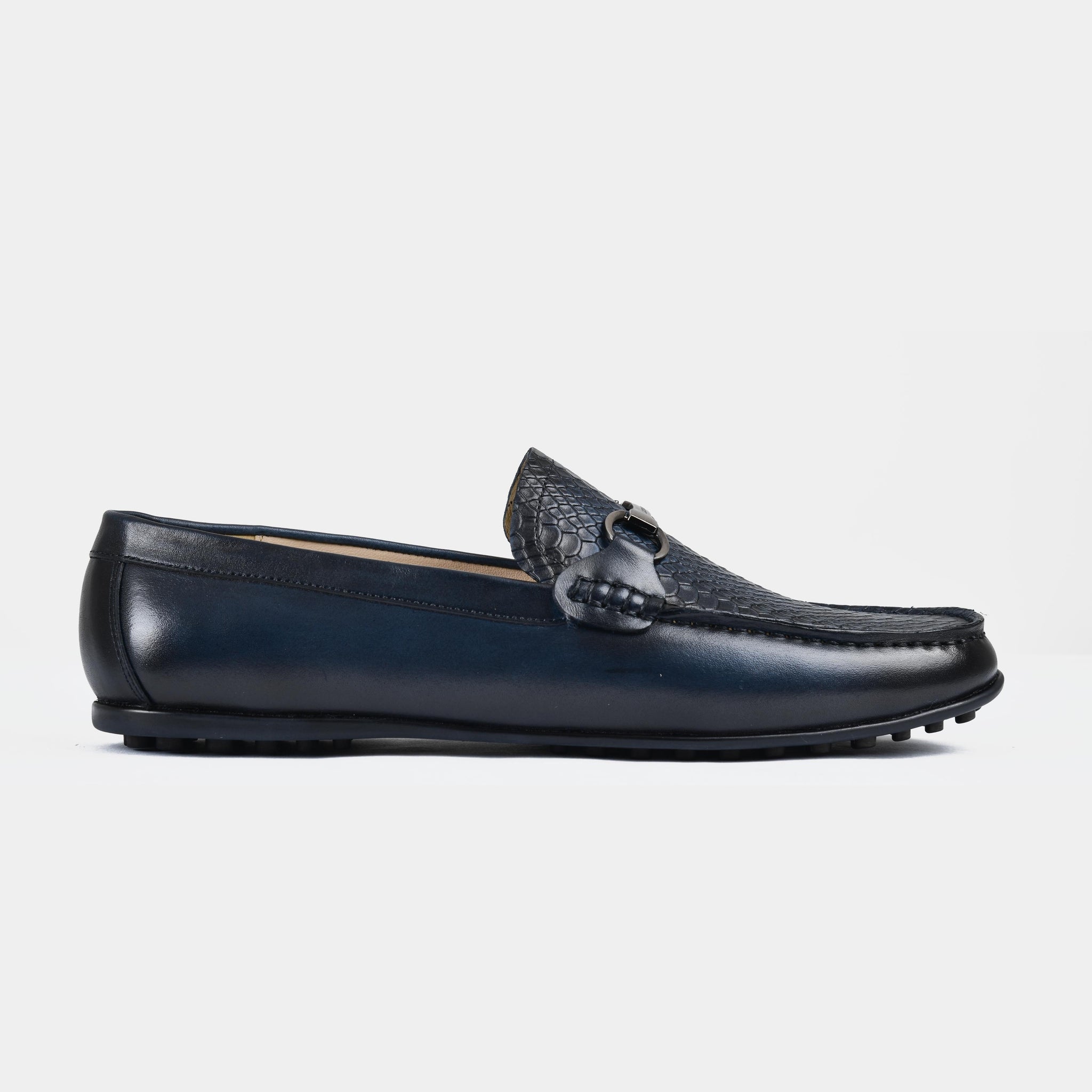 Pair of Matias Blue Leather Driving Loafers with a textured accent and metal buckle detail.