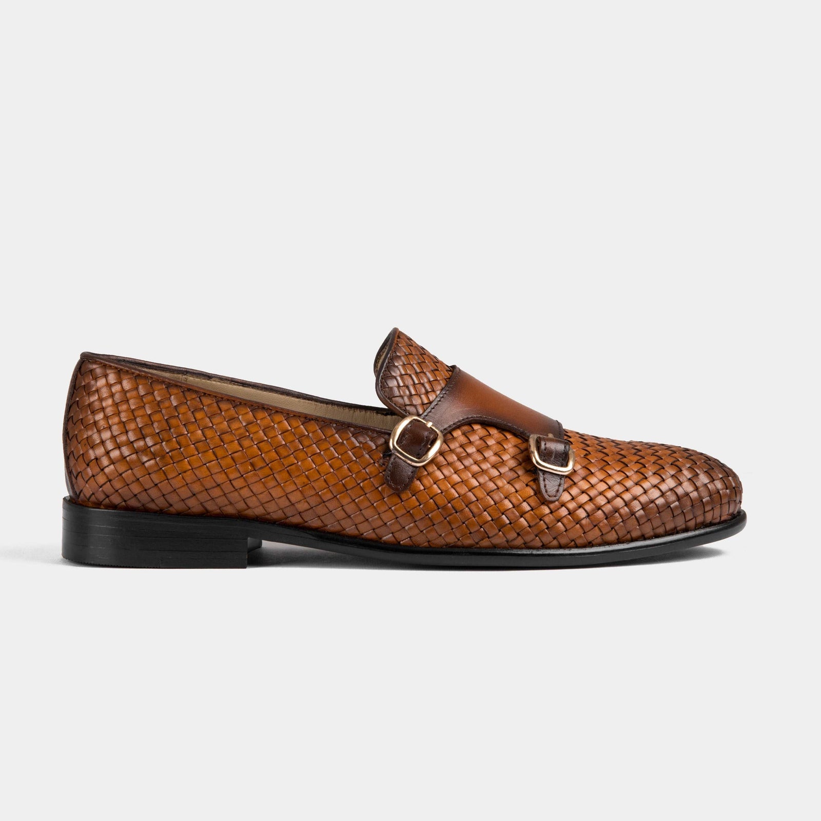 Tan leather Ciro Weaved monk strap shoes with a woven leather upper and double gold buckles.