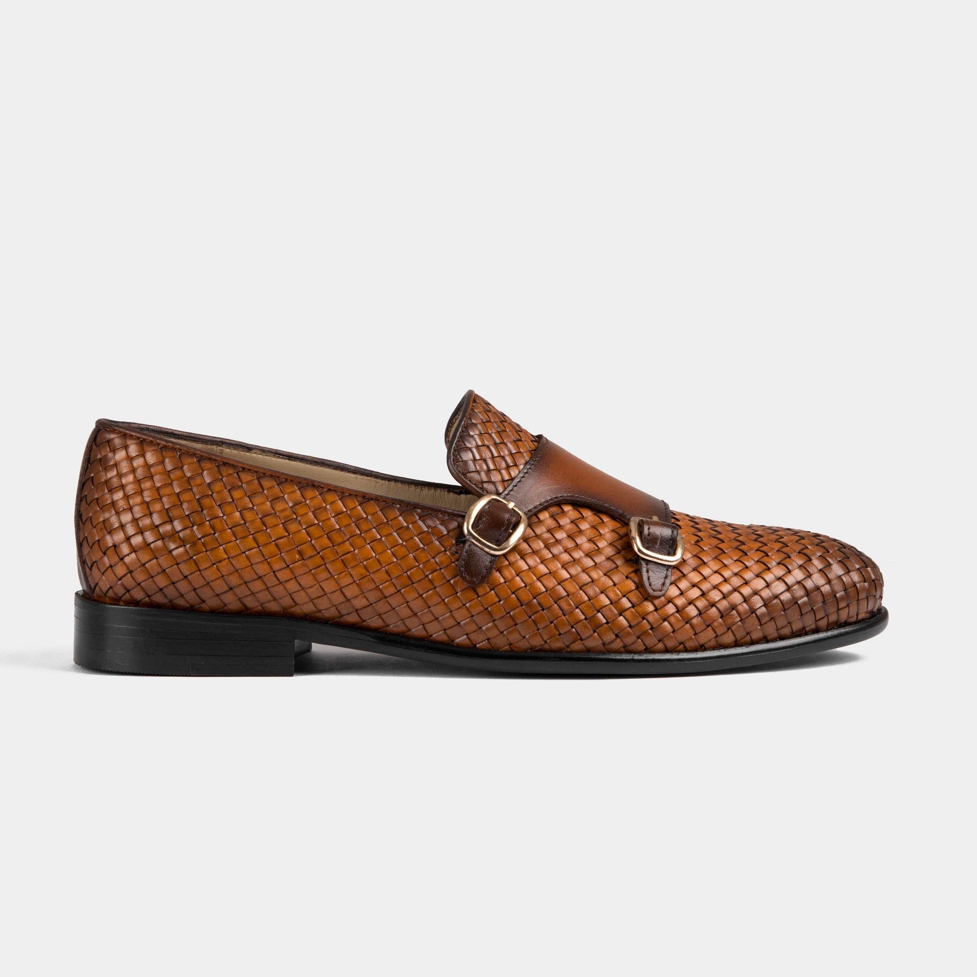 Tan leather Ciro Weaved monk strap shoes with a woven leather upper and double gold buckles.