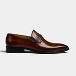 Side view of Diaz Choc Loafers, featuring brown leather upper with a crocodile-embossed strap and metal buckle detail.