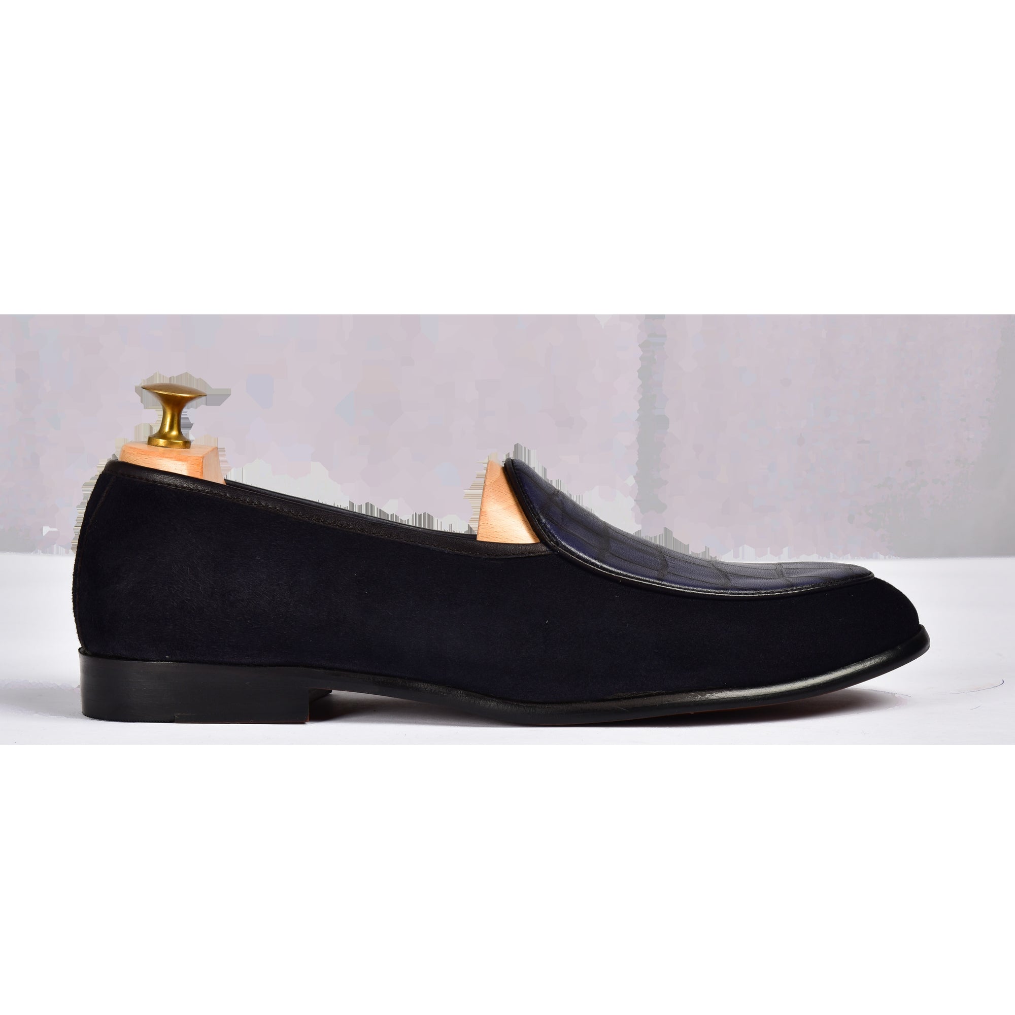 Pair of blue suede Arno Loafers with textured leather detail on the vamp.