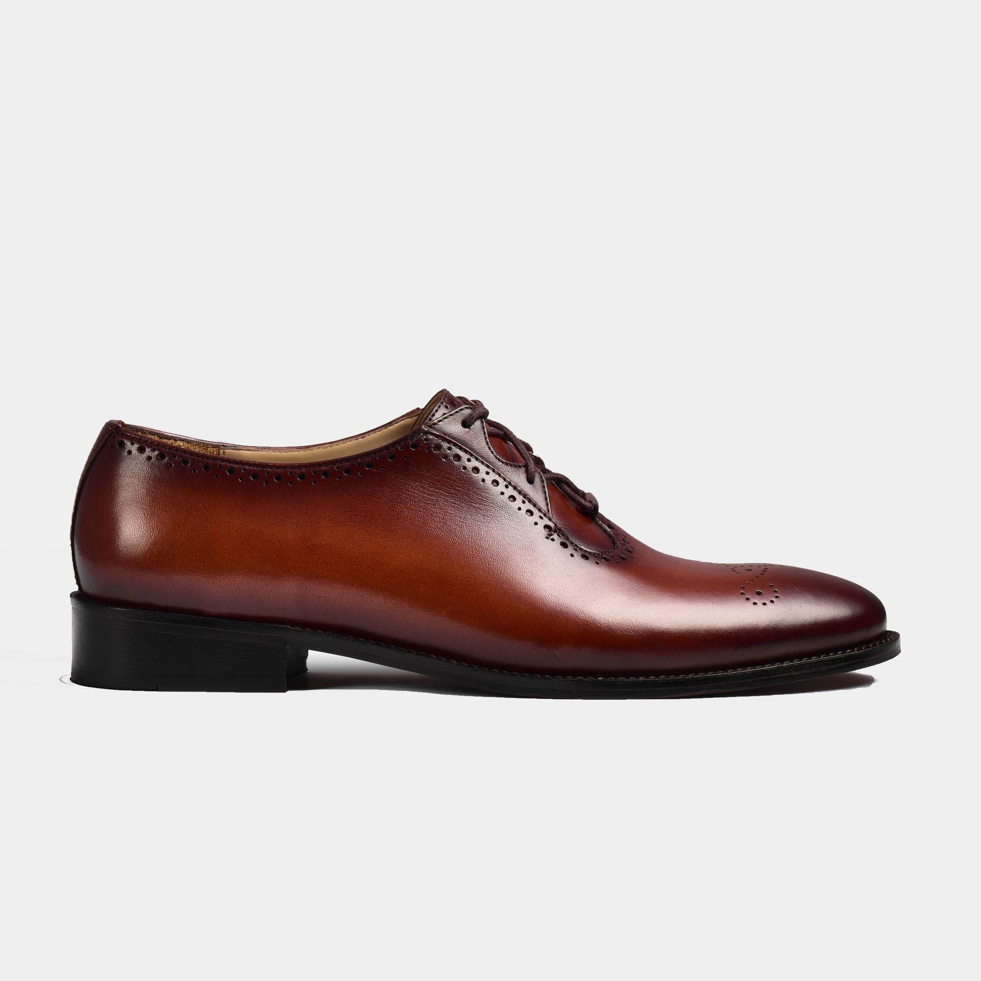 A side view of brown two-toned Alessandro Barone hand-stitched formal blucher shoes for men.