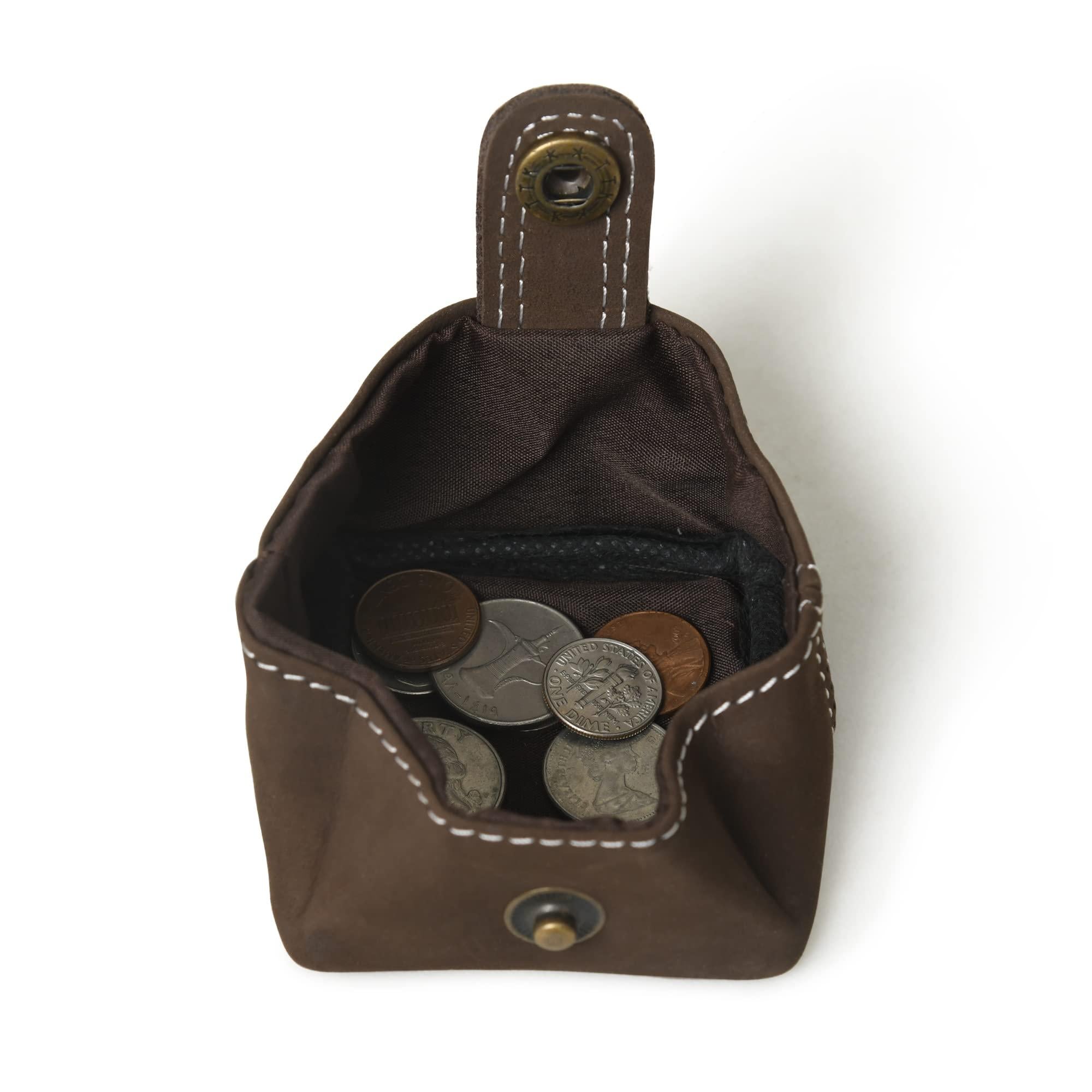 Open brown nubuck leather coin purse with snap closure, showcasing its soft interior and capacity to hold various coins.