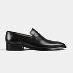 A pair of Laredo Black Leather Loafers on a white background.