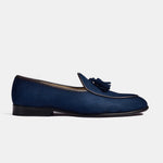 A side view of the Arno Loafers in blue suede. The loafers feature classic tassels and a sleek, sophisticated design.