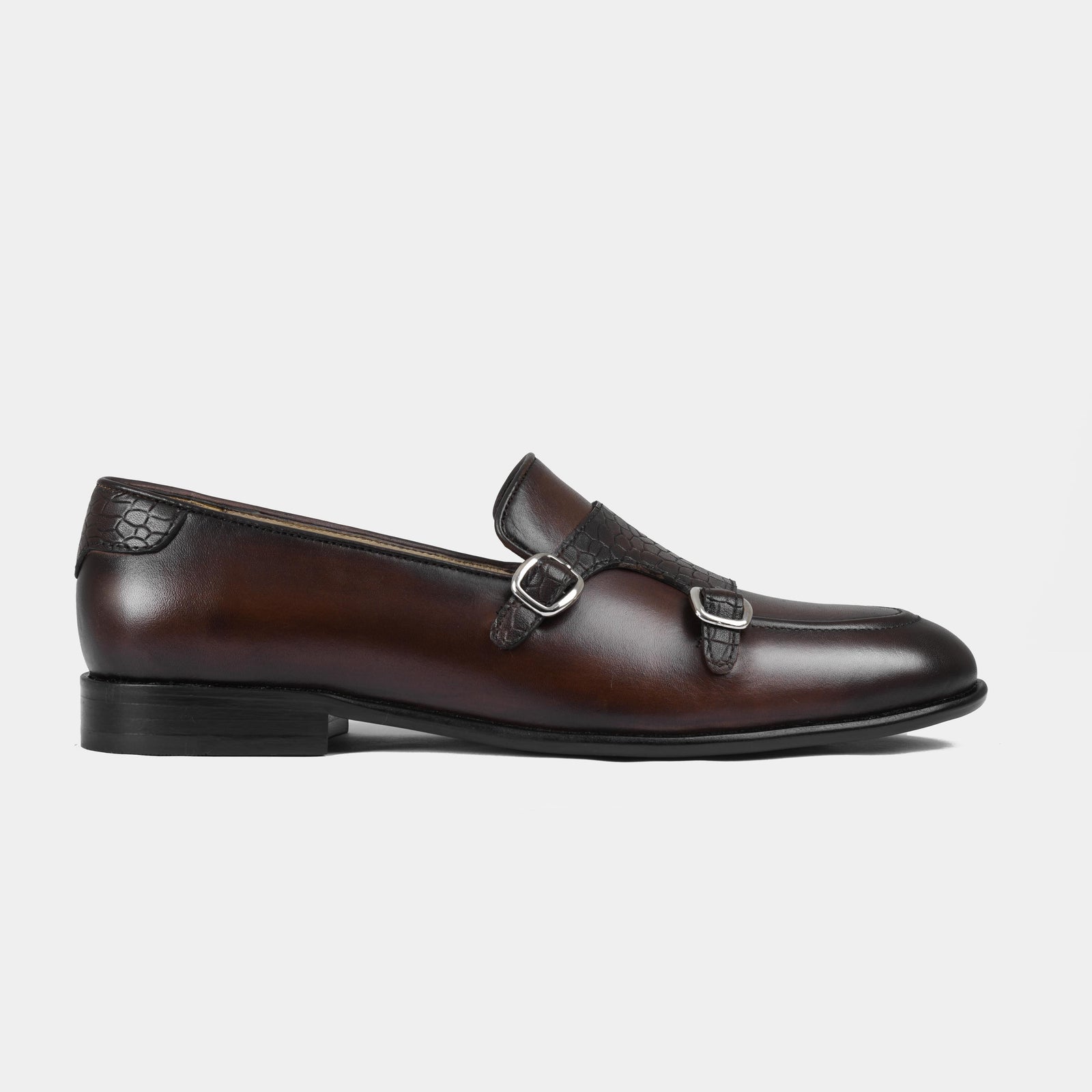 Armeo Brown Leather Monk Straps with stylish double buckles on a sleek brown leather dress shoe.