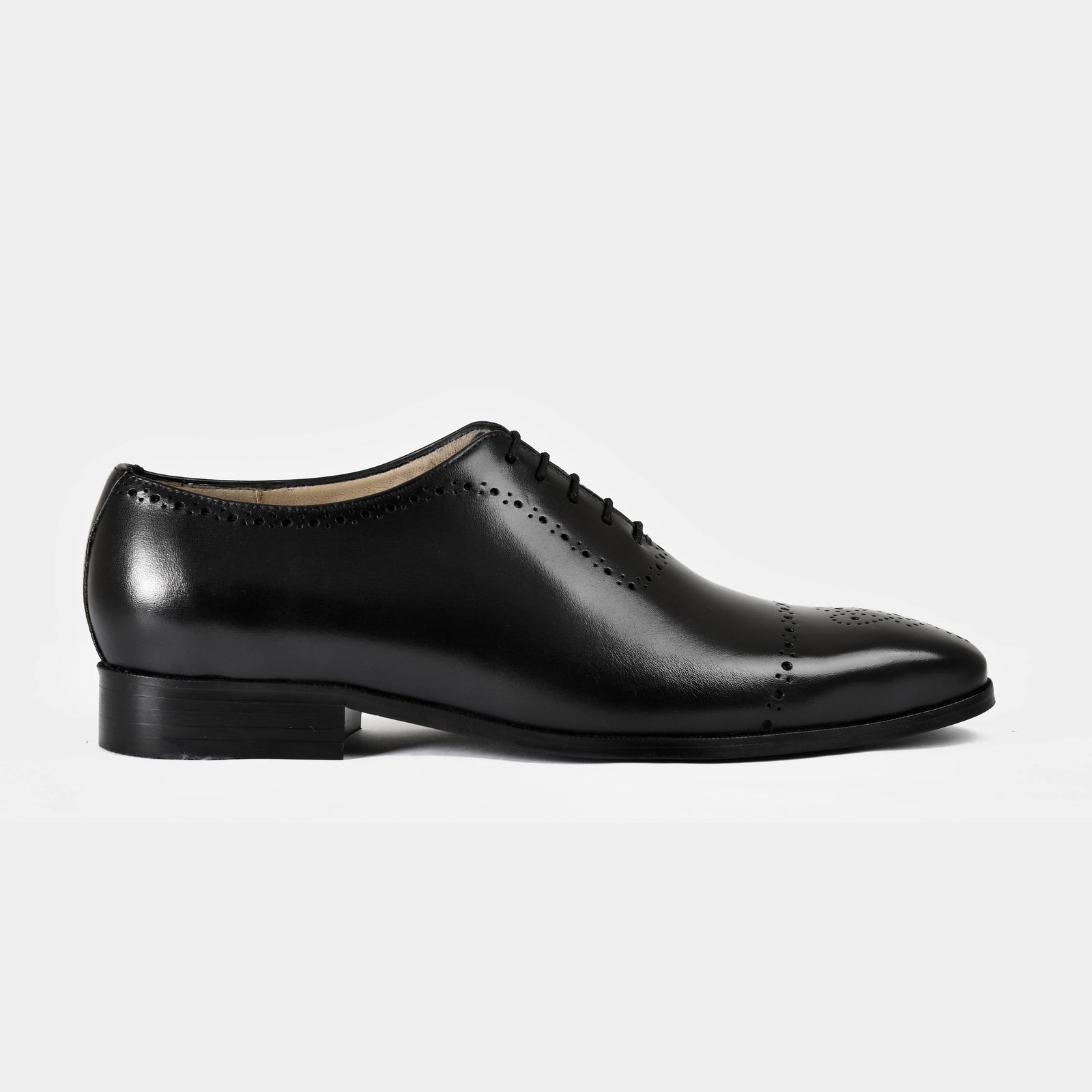 Lonzo black leather dress shoes with brogue detailing and black laces.