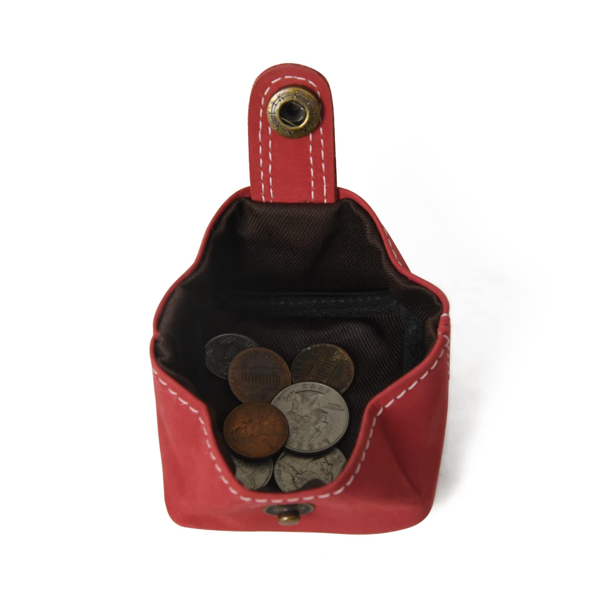 Open red leather coin purse with coins inside. Classic Red Velvet Premium Leather Mini Coin Pouch for Men Women.