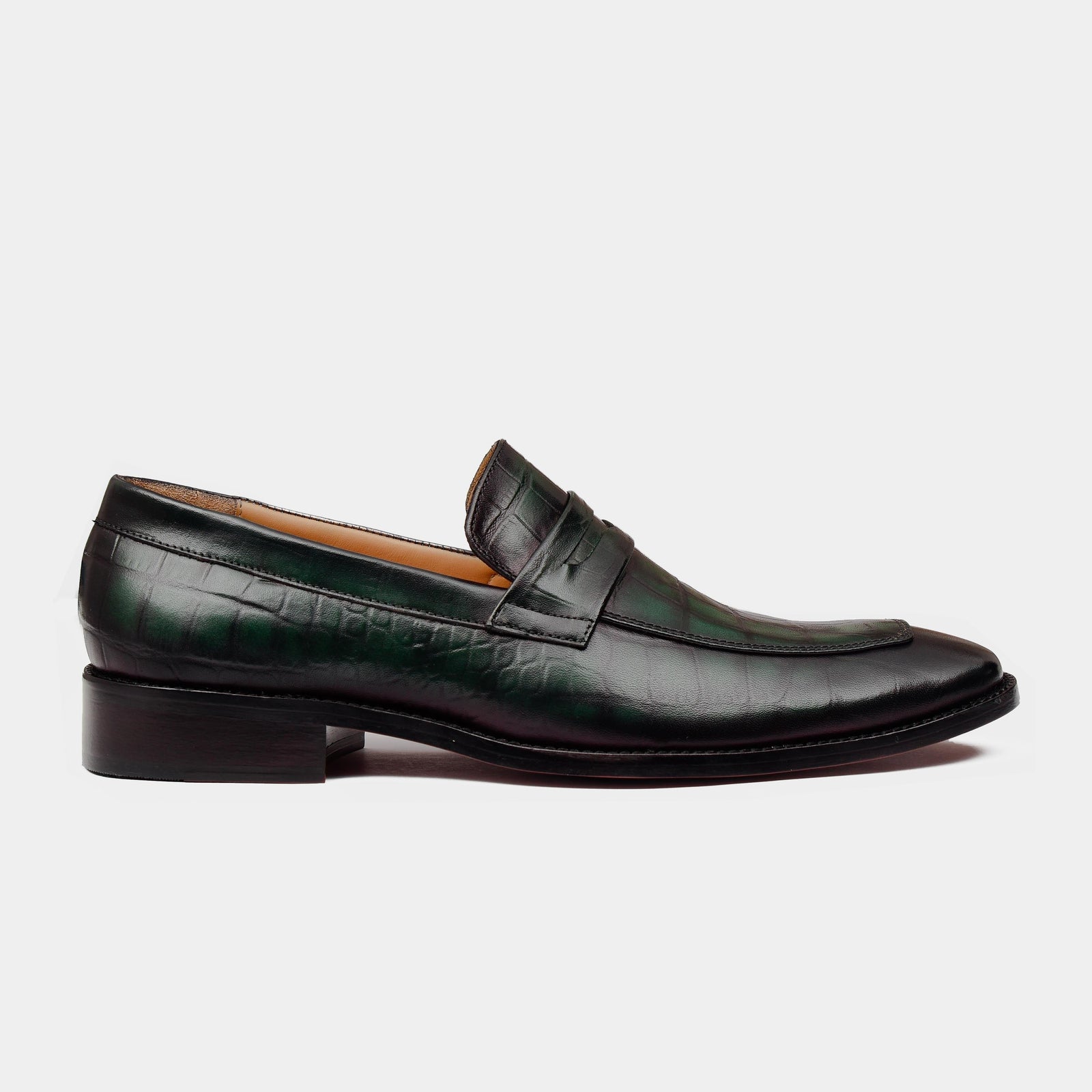 Pair of Arthur Hertz Leather Loafers in green, showcasing their stylish crocodile-embossed leather upper and classic penny loafer design.