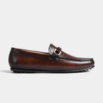 Side view of Pablo Brown Leather Driving Loafers with a braided strap and metal accent.