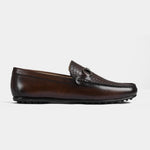 Pair of Matias Brown Leather Driving Loafers with a textured vamp and metal accent.