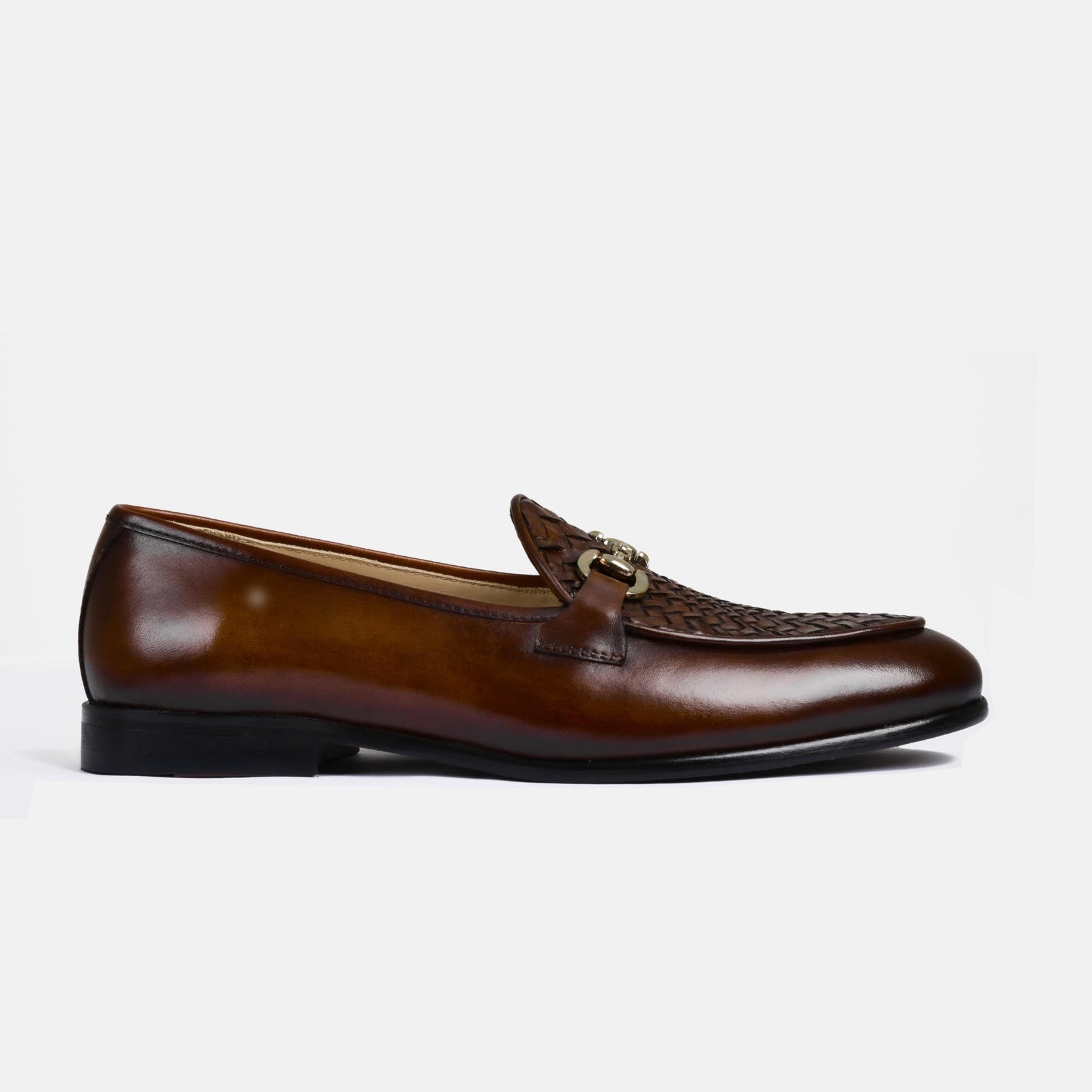 A pair of Santiago Weaved Brown Leather Loafers with a woven leather strap and gold buckle detail.