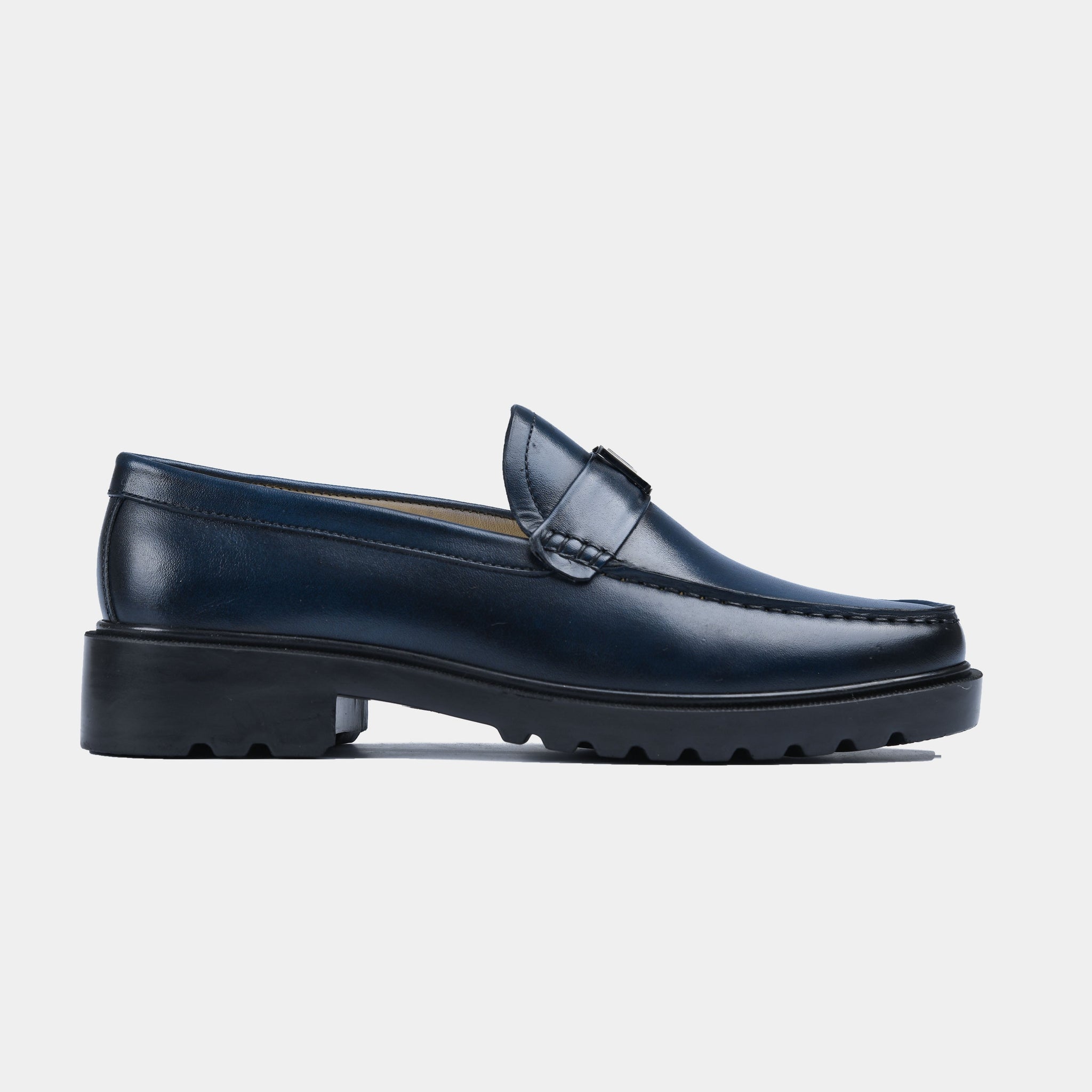 A pair of stylish blue leather loafers with a chunky outsole. Blue Lf Timeless Leather Loafers with Solesculpt Lite technology for comfort.