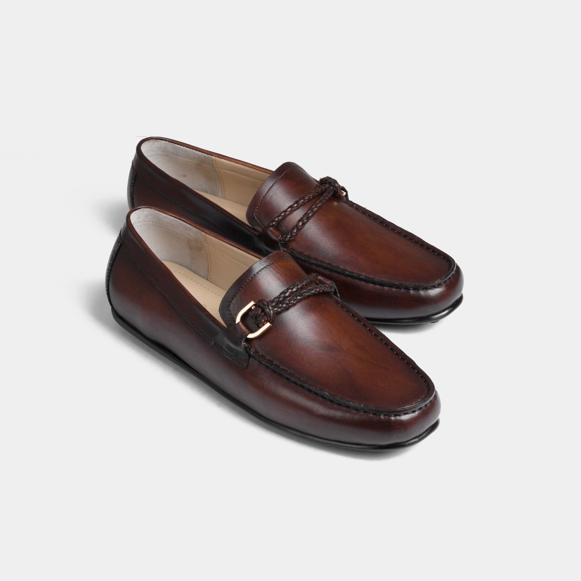 Pair of Pablo Brown Leather Driving Loafers with braided strap detail.