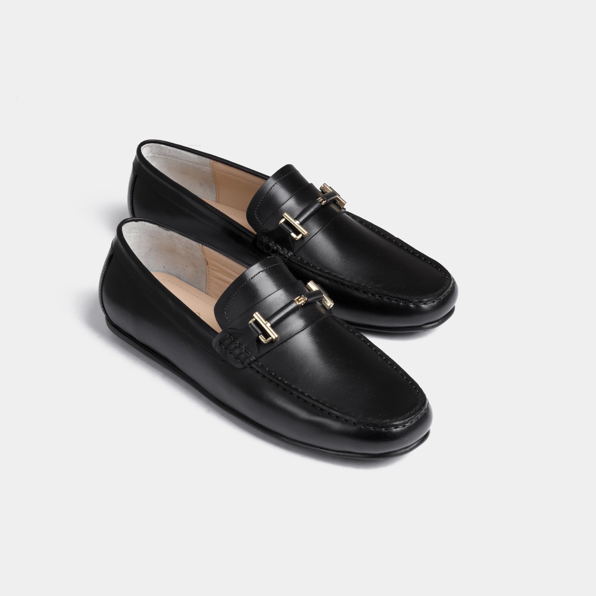 Pair of Diablo Black Driving Loafers with gold metal hardware accent on the vamp.