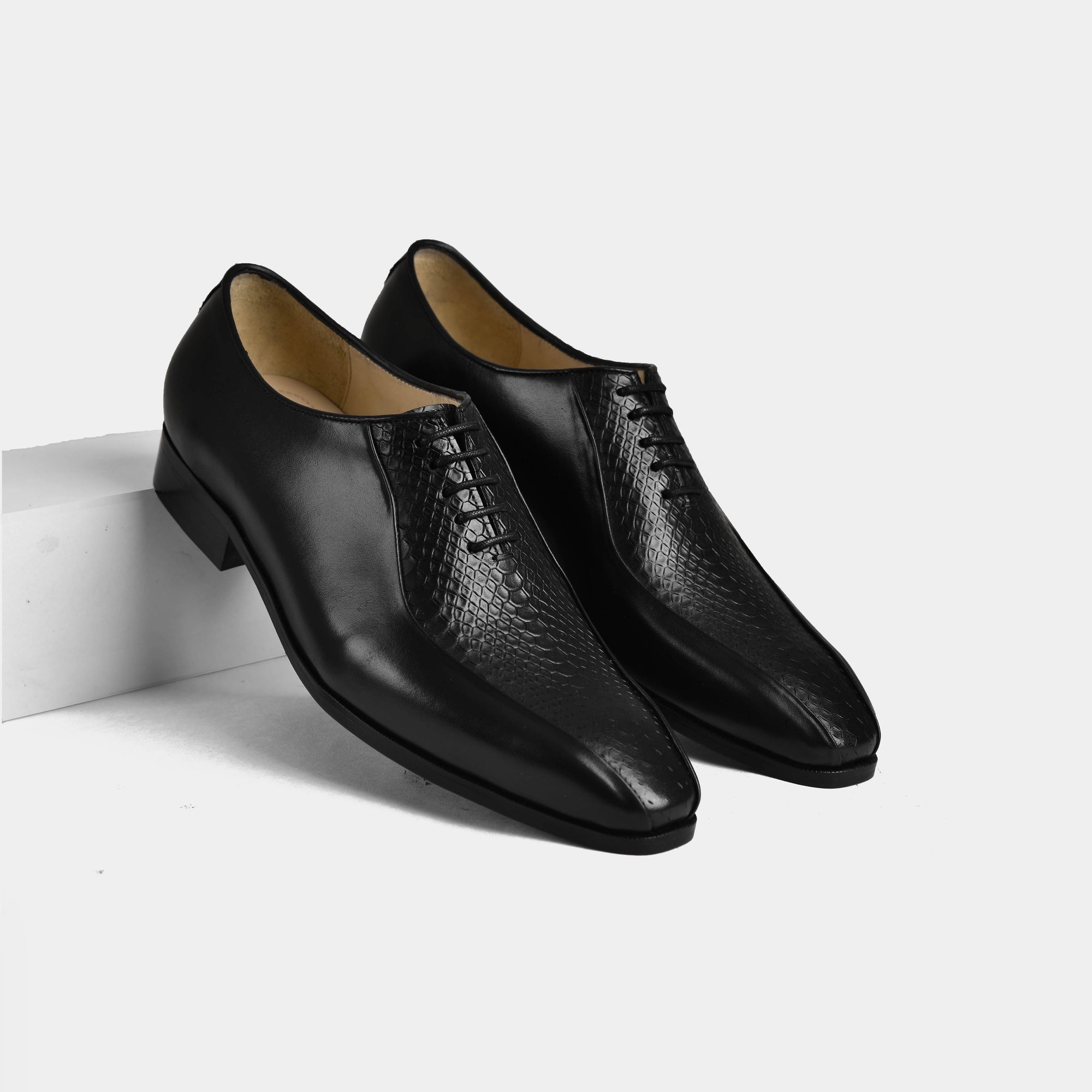 Armando Black Leather Laceups with a stylish snakeskin pattern on the toe cap.