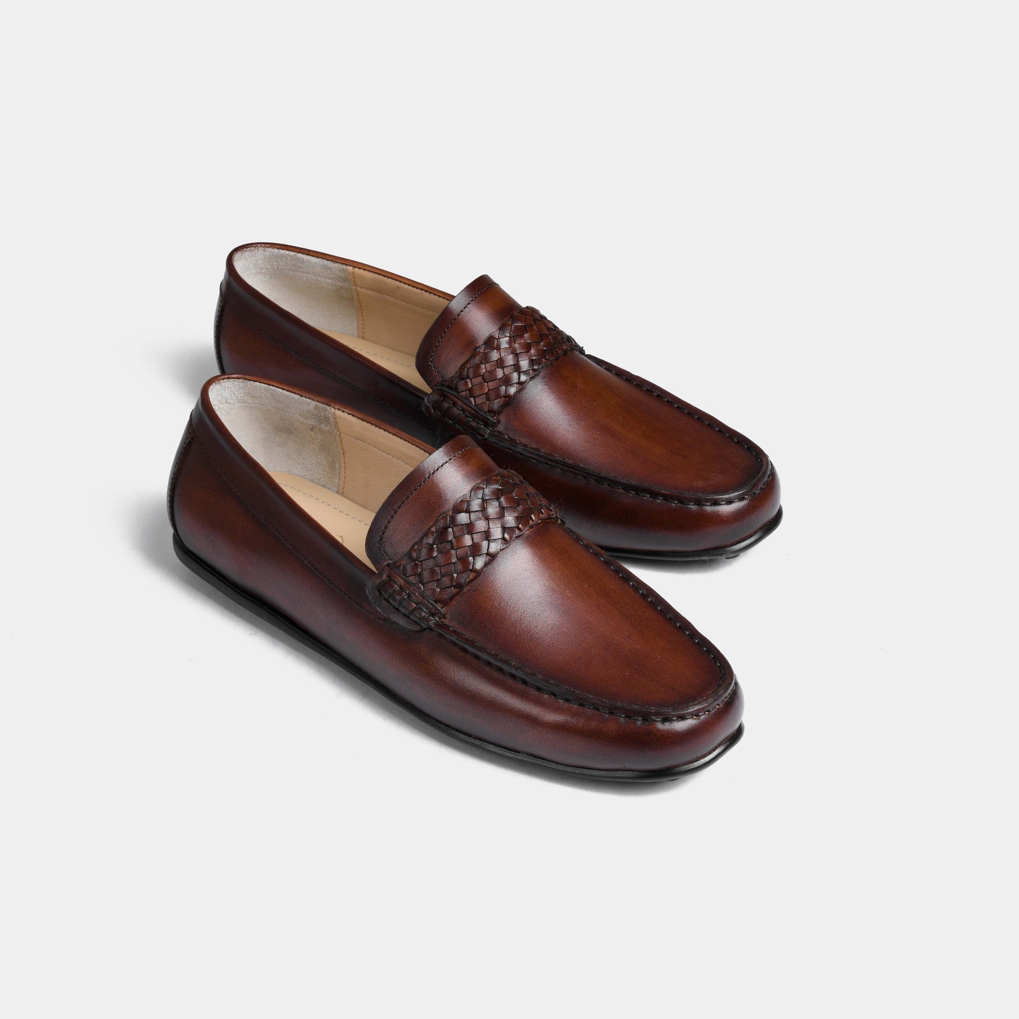 Pair of Denver Brown Leather Driving Loafers with woven strap detail.