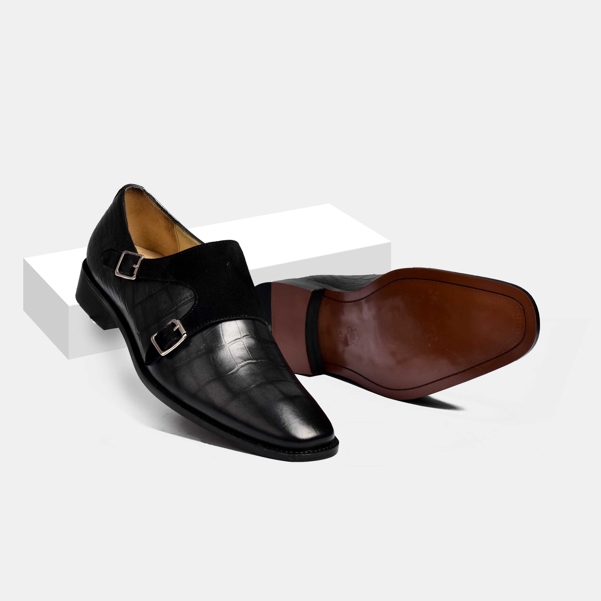 Pair of black Nathan Roy Leather Monk Straps, showcasing the double buckle closure and textured leather finish.