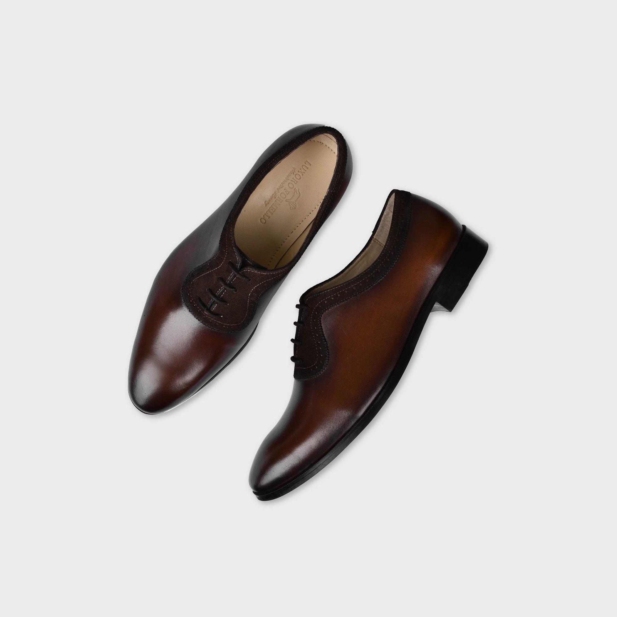 Pair of Orlan Brown Leather Laceups, a stylish men's dress shoe, shown from a top-down view on a white background.