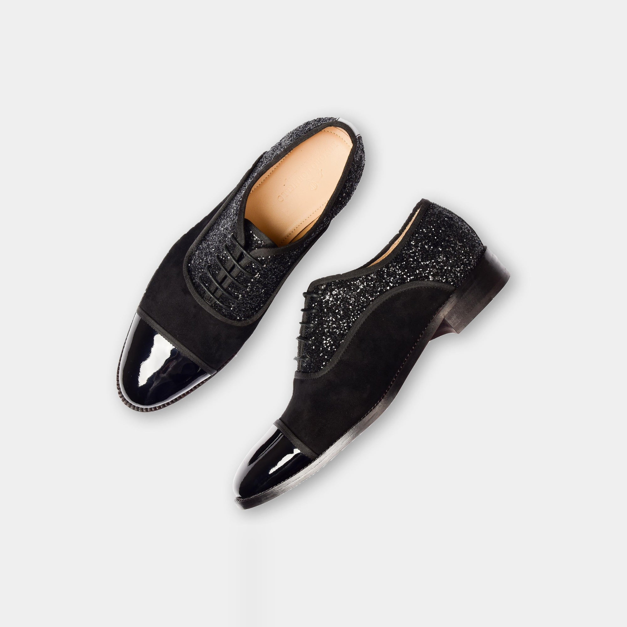 Pair of Liam Glitz Leather Laceups, black suede with glitter accents and a patent leather cap toe.