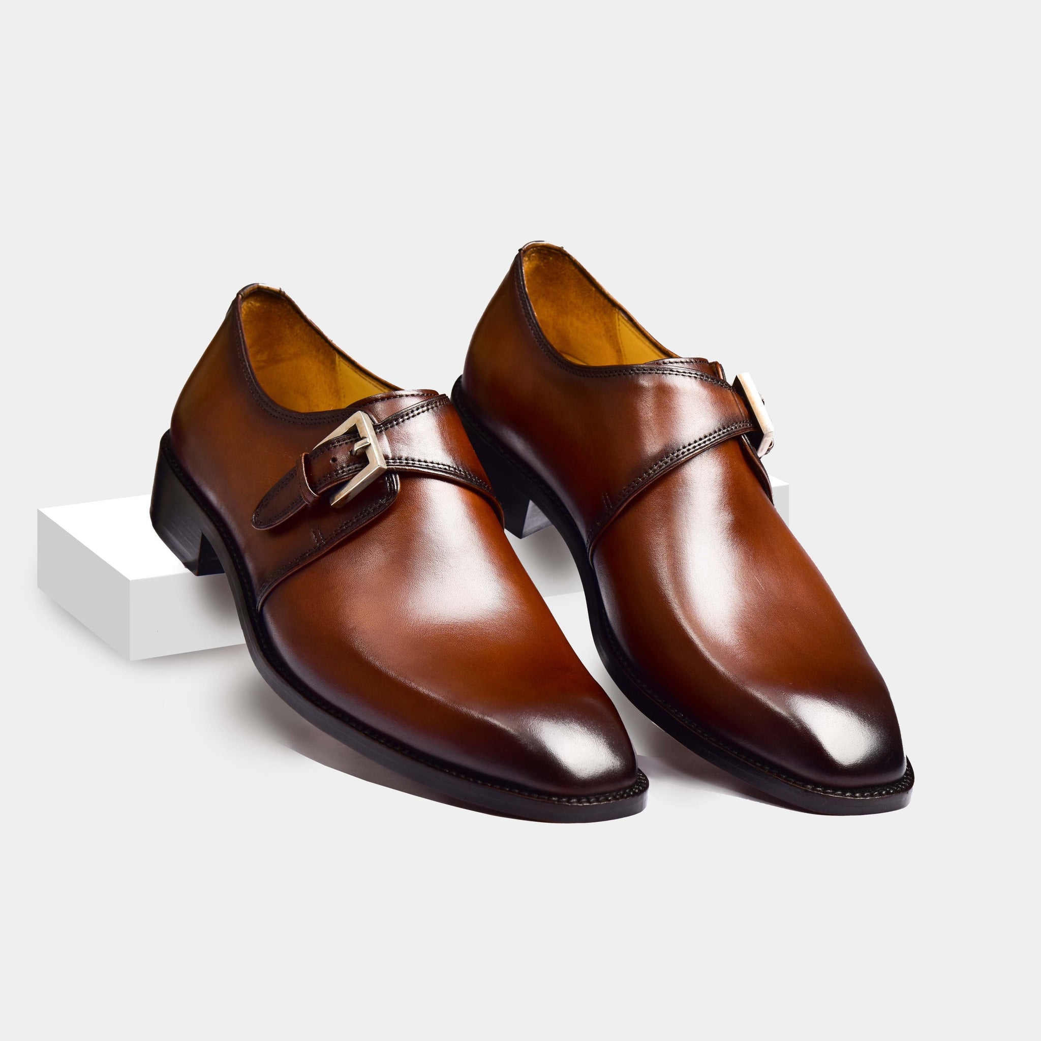 Pair of Ross Single Leather Monk Straps in brown leather with a single monk strap and silver buckle.