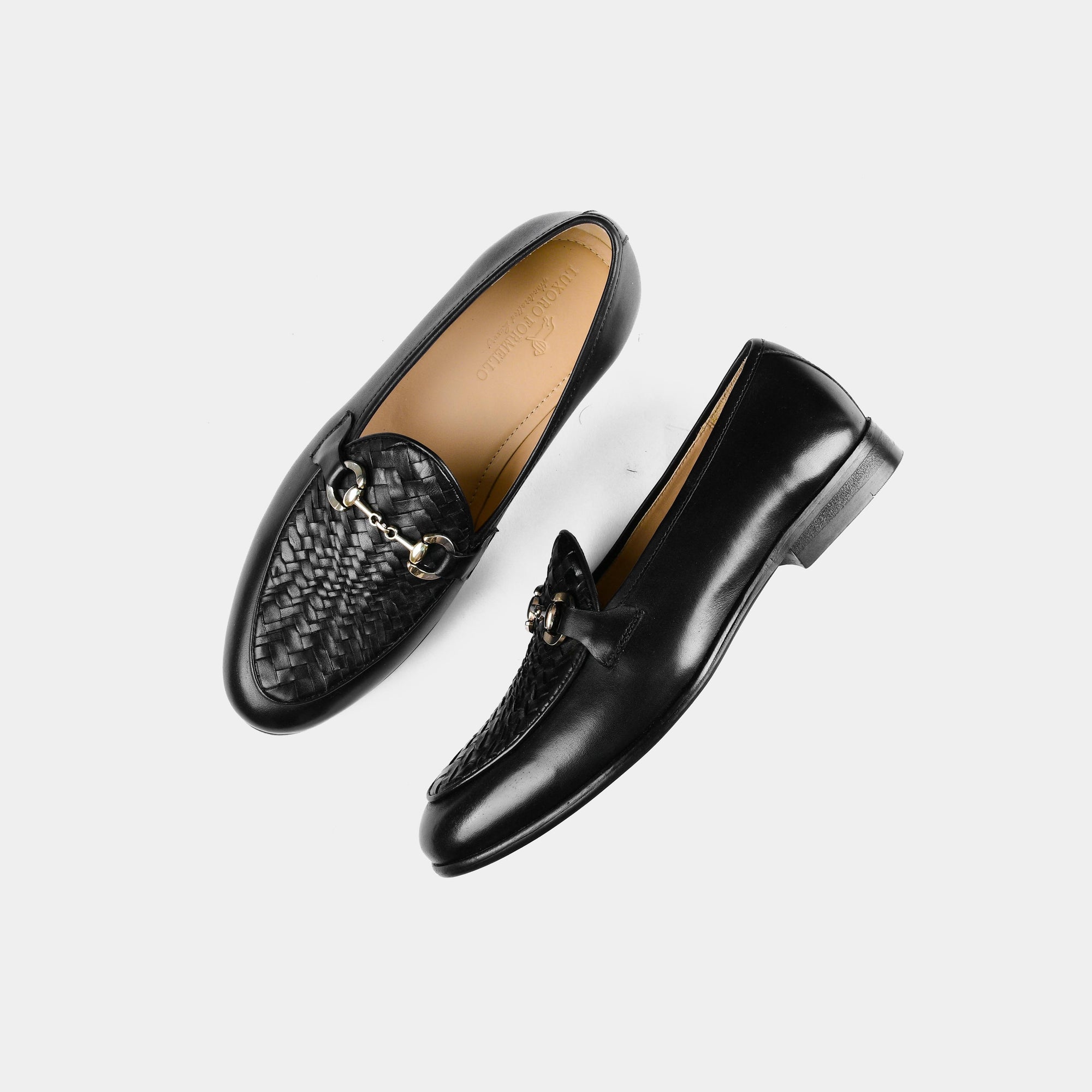 Pair of Santiago Weaved Black Leather Loafers with a woven detail and silver buckle accent.