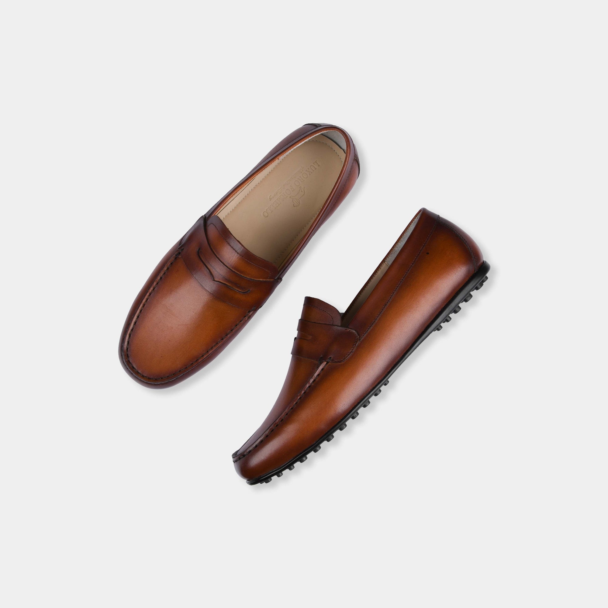 Pair of Javier Tan Leather Driving Loafers in tan leather shown from above.