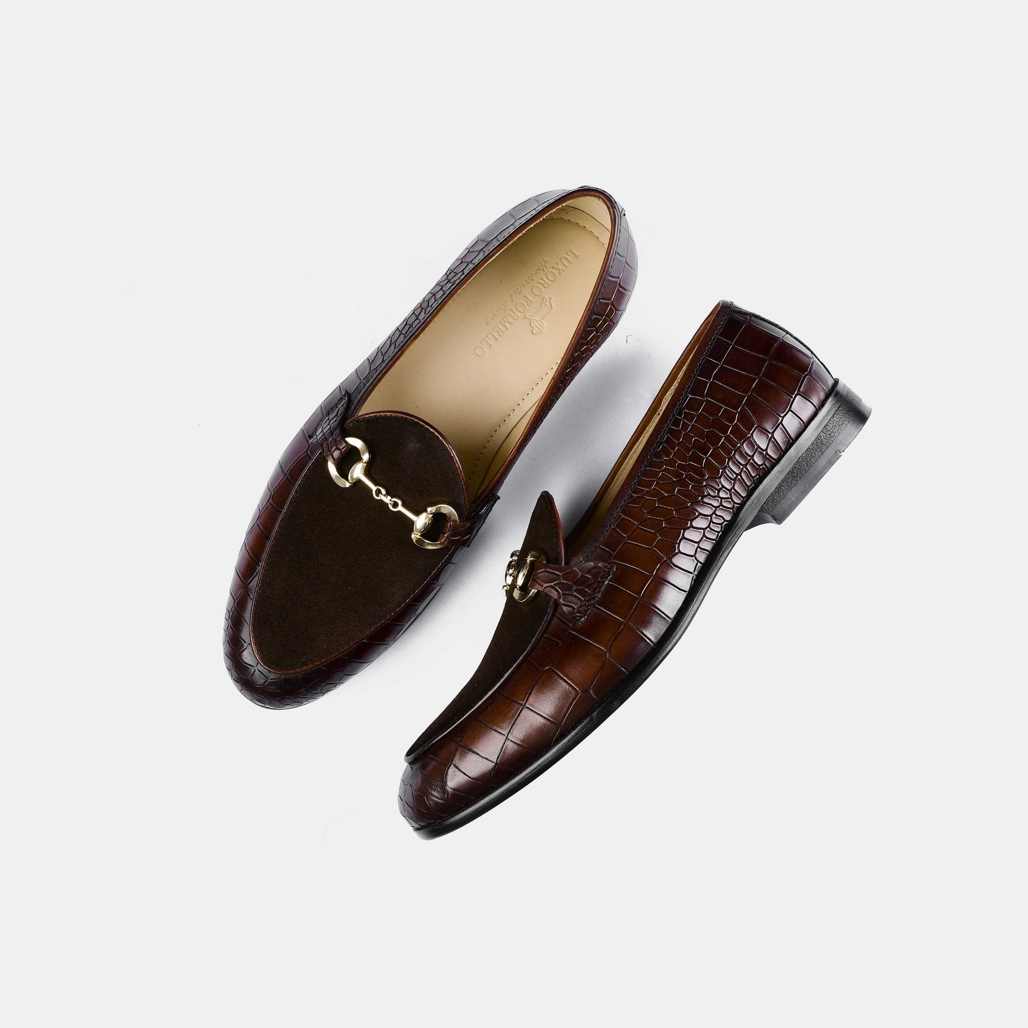 Pair of Azura Brown Leather Loafers with a gold buckle detail, showcasing the brown suede and crocodile-embossed leather.