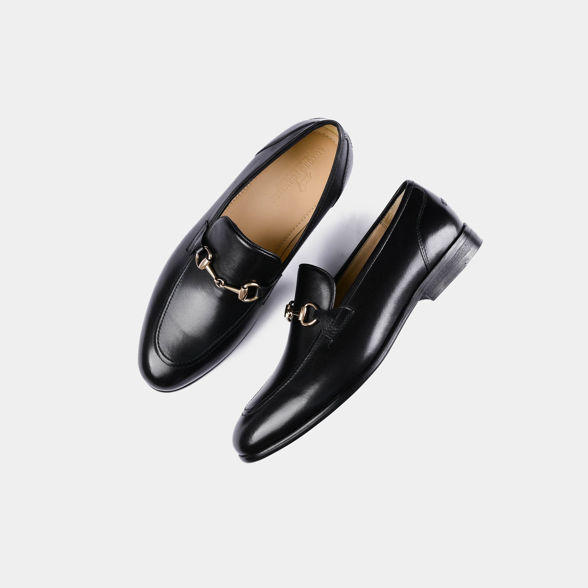 Pair of Emerald Black Leather Loafers with gold snaffle bit hardware.