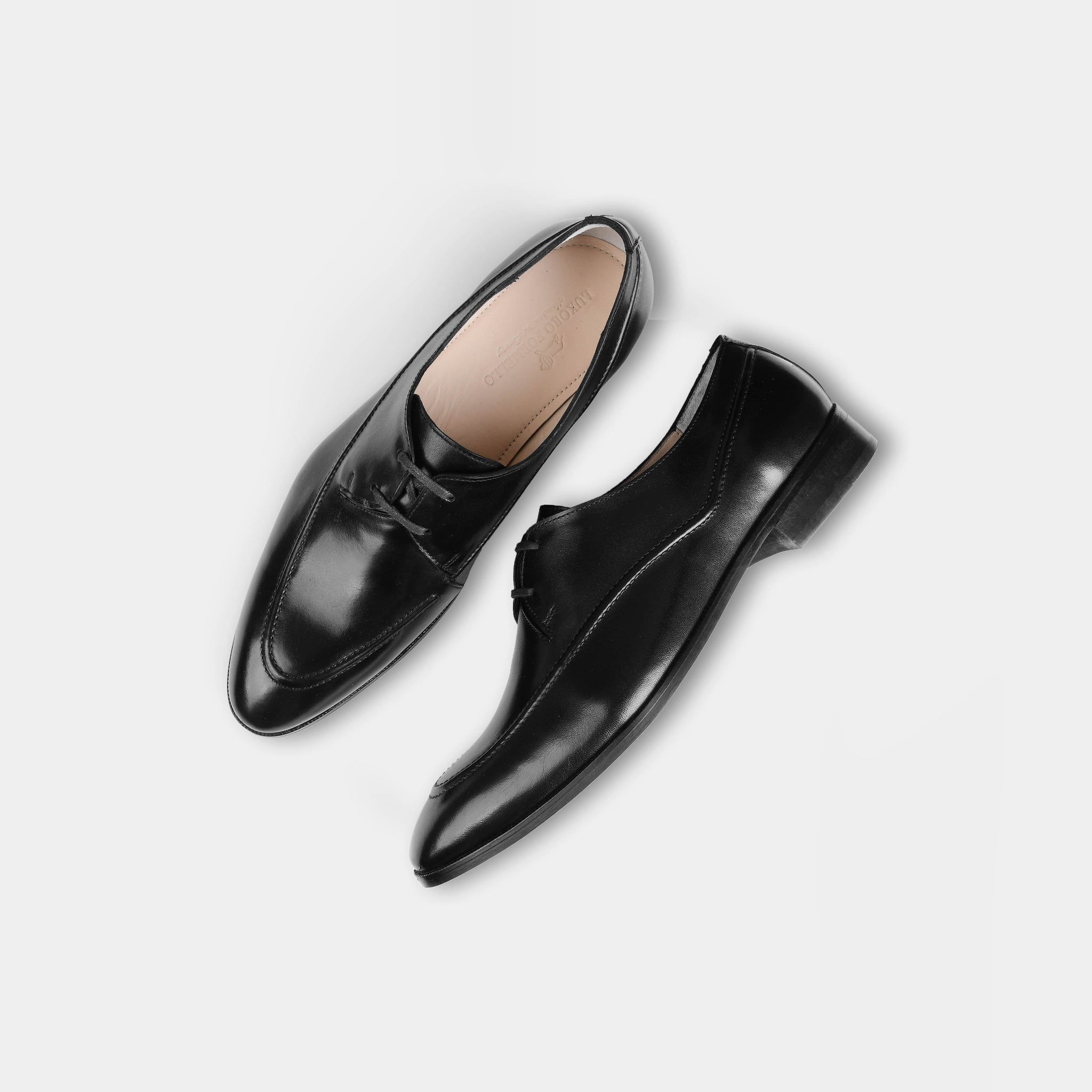 Pair of Marcos Charcoal Lace Ups, sleek black leather dress shoes, on a white background.