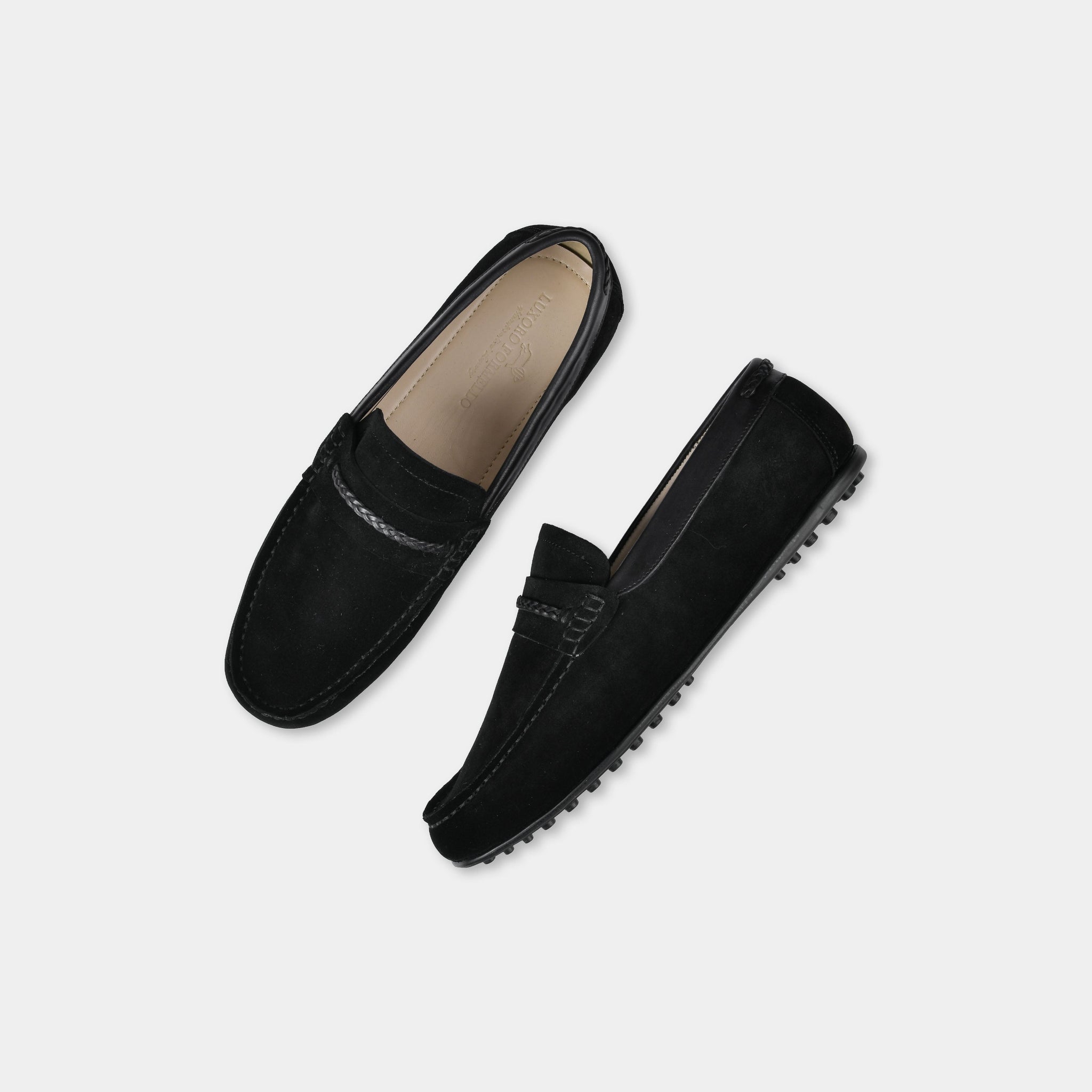 Pair of Nazario Black Suede Leather Driving Loafers with braided strap detailing.