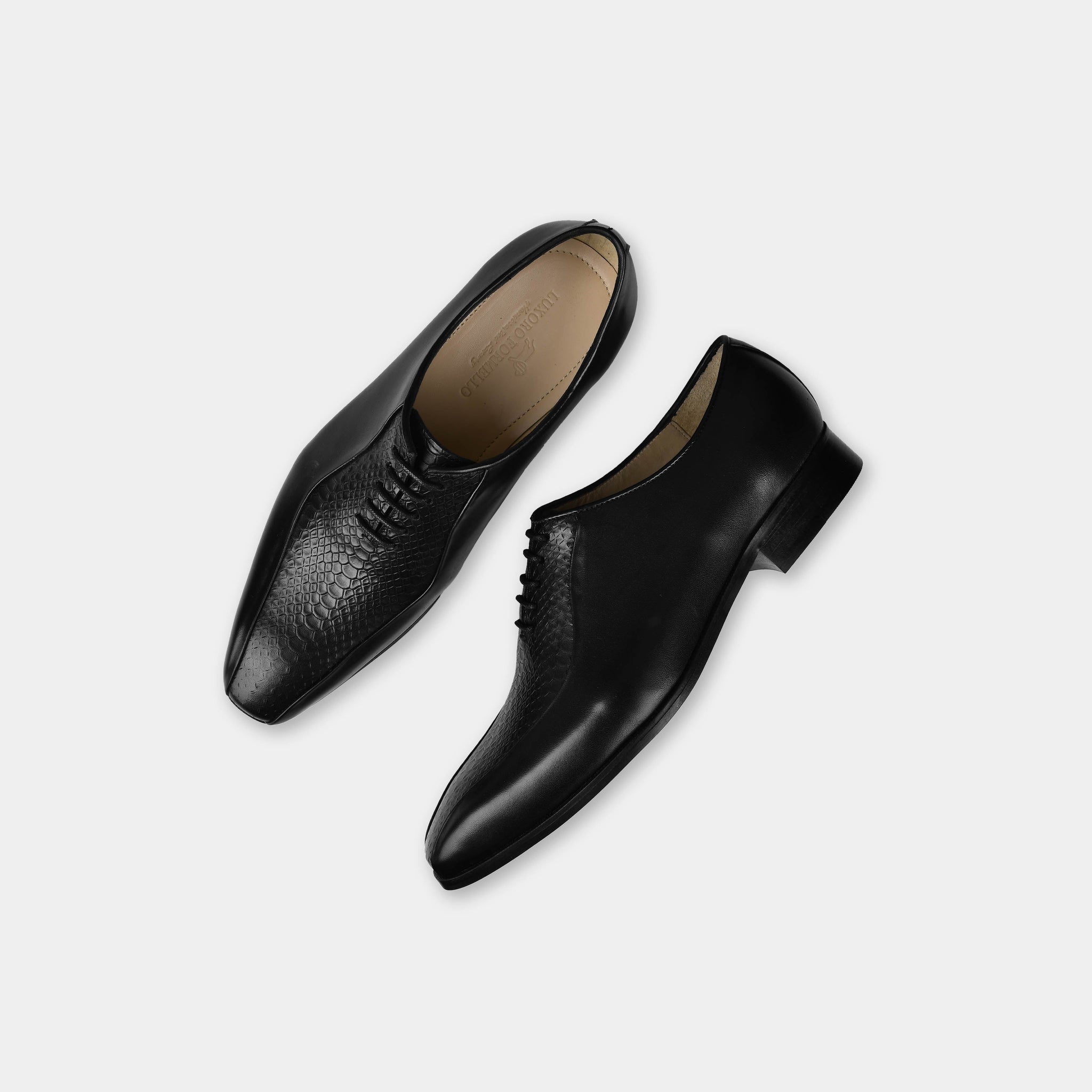 Pair of Armando Black Leather Laceups, crafted from black leather with a textured toe panel.