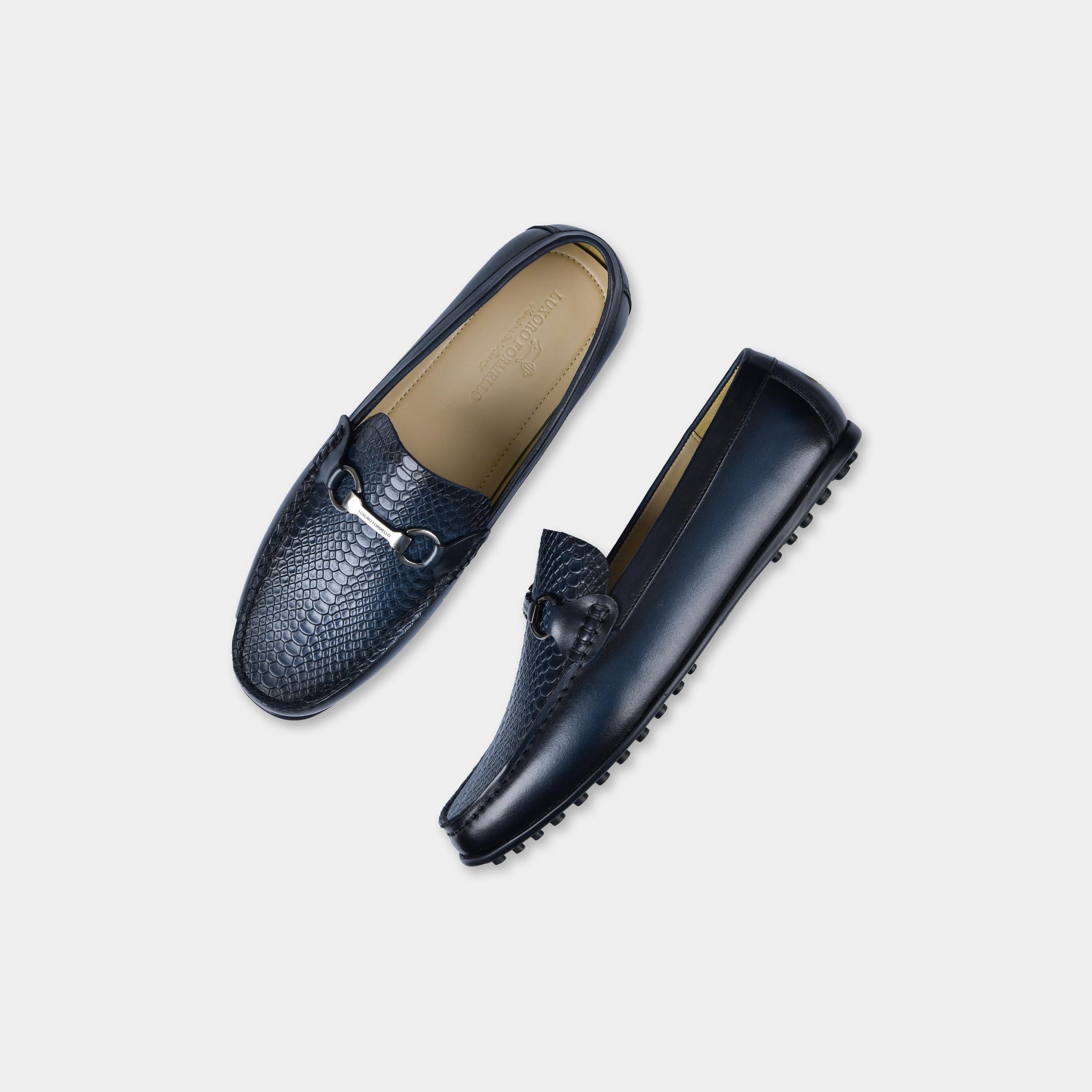 Pair of Matias Blue Leather Driving Loafers with silver buckle detail, shown from above.