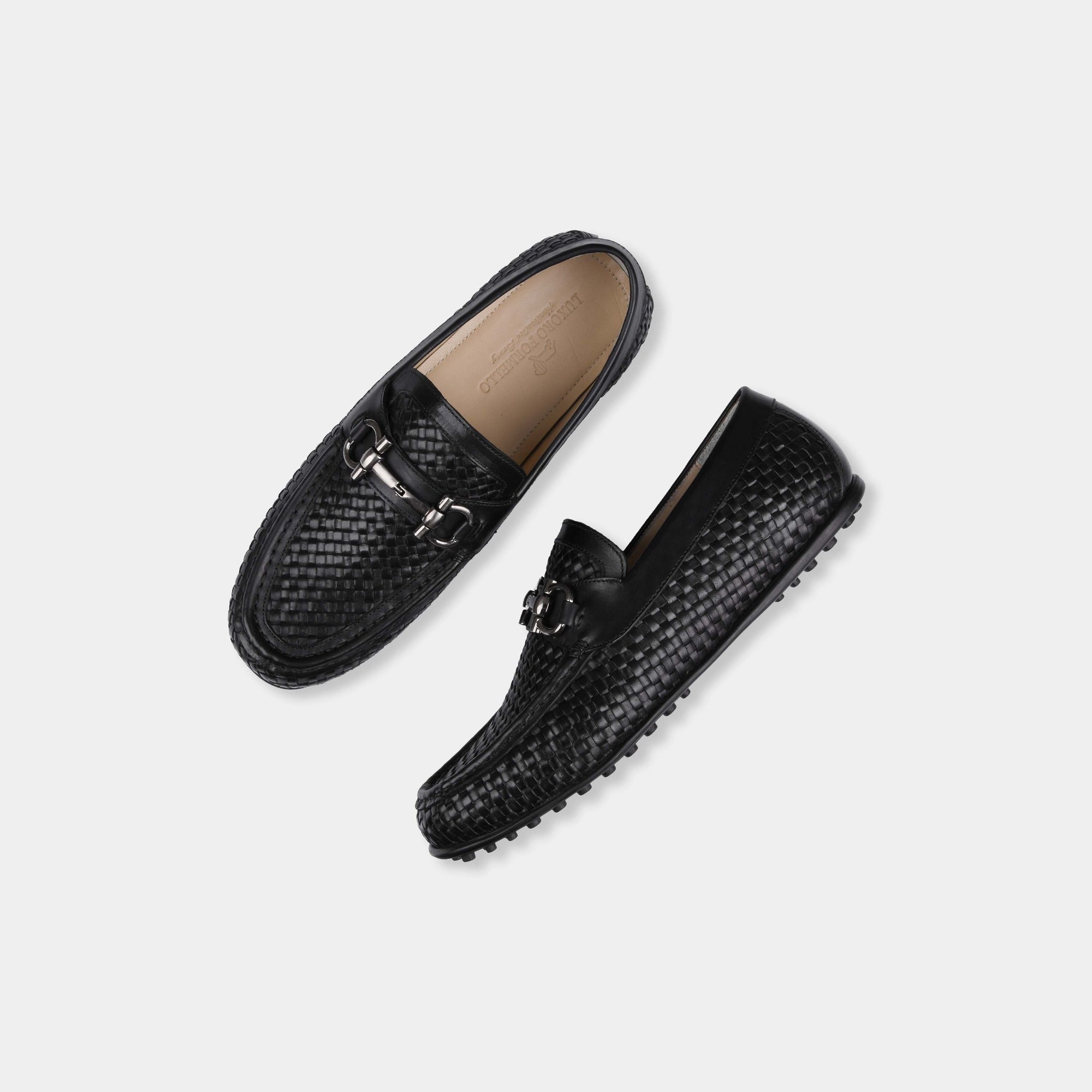 Pair of Lucio Weaved Black Leather Driving Loafers with a woven design and silver buckle detail.