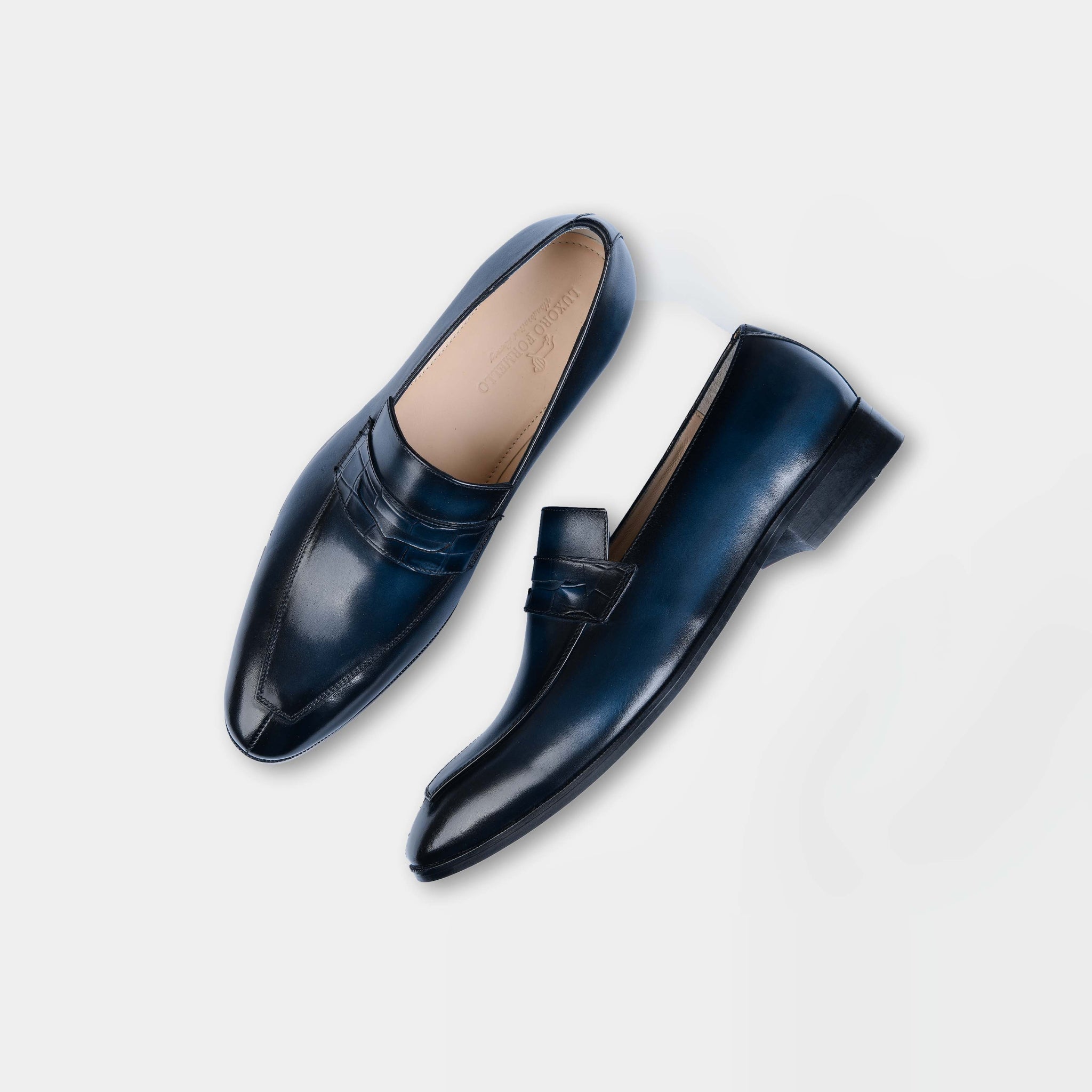 Pair of Lucero Blue Leather Loafers, showcasing their sleek design and rich blue color.