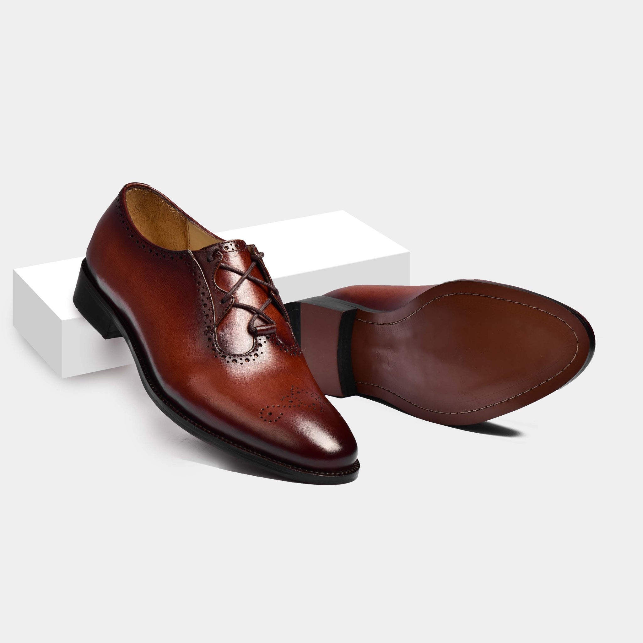 Pair of Alessandro Barone two-toned brown leather blucher shoes with broguing detail, showcasing both side and sole view.