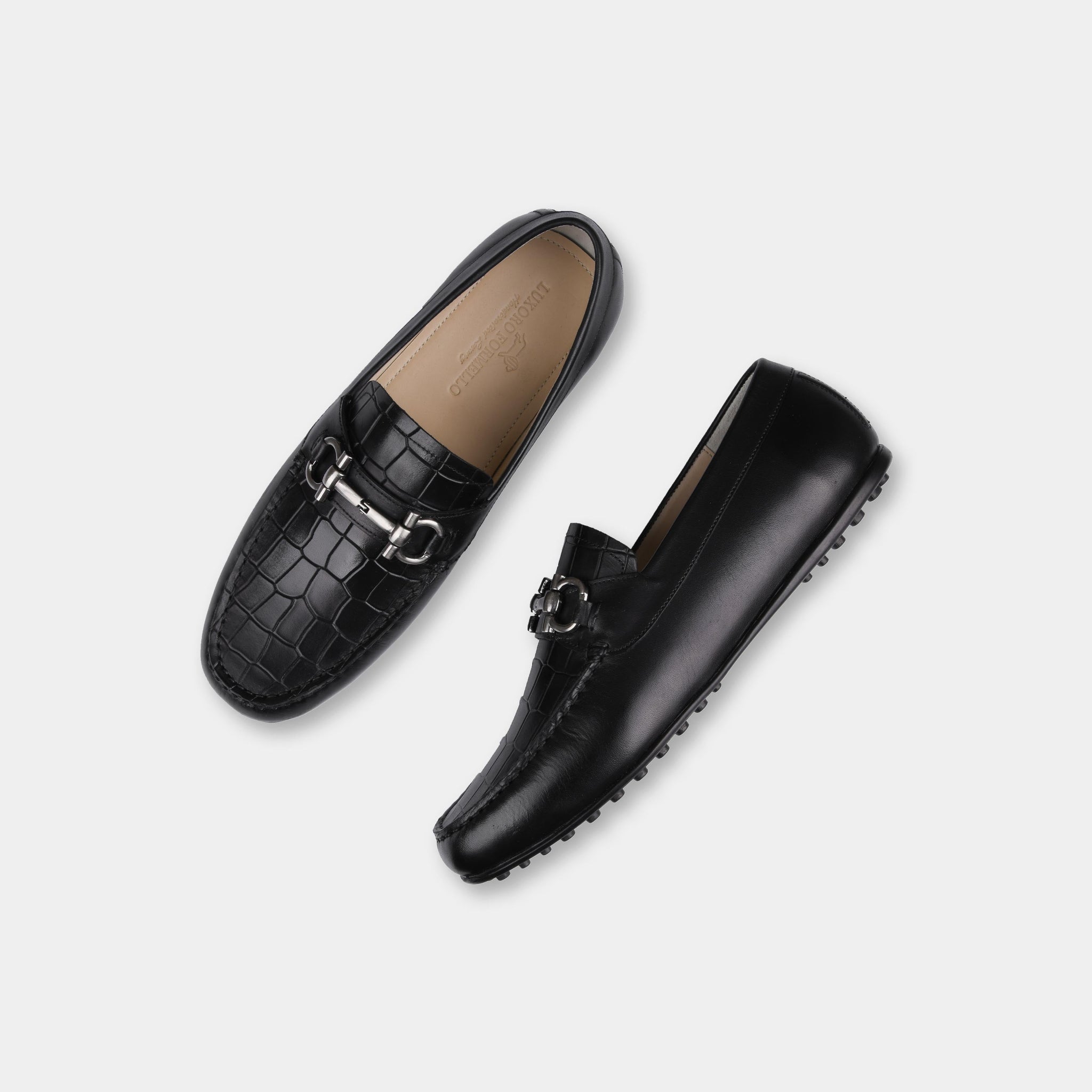 Pair of Alonzo Black Leather Driving Loafers with silver buckle accent, shown from above.