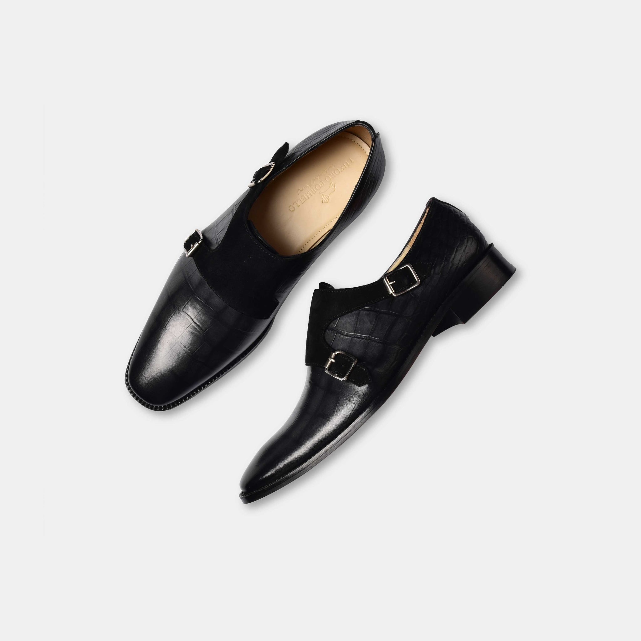 A pair of Nathan Roy Leather Monk Straps in black, showcasing the double buckle closure and textured leather upper.