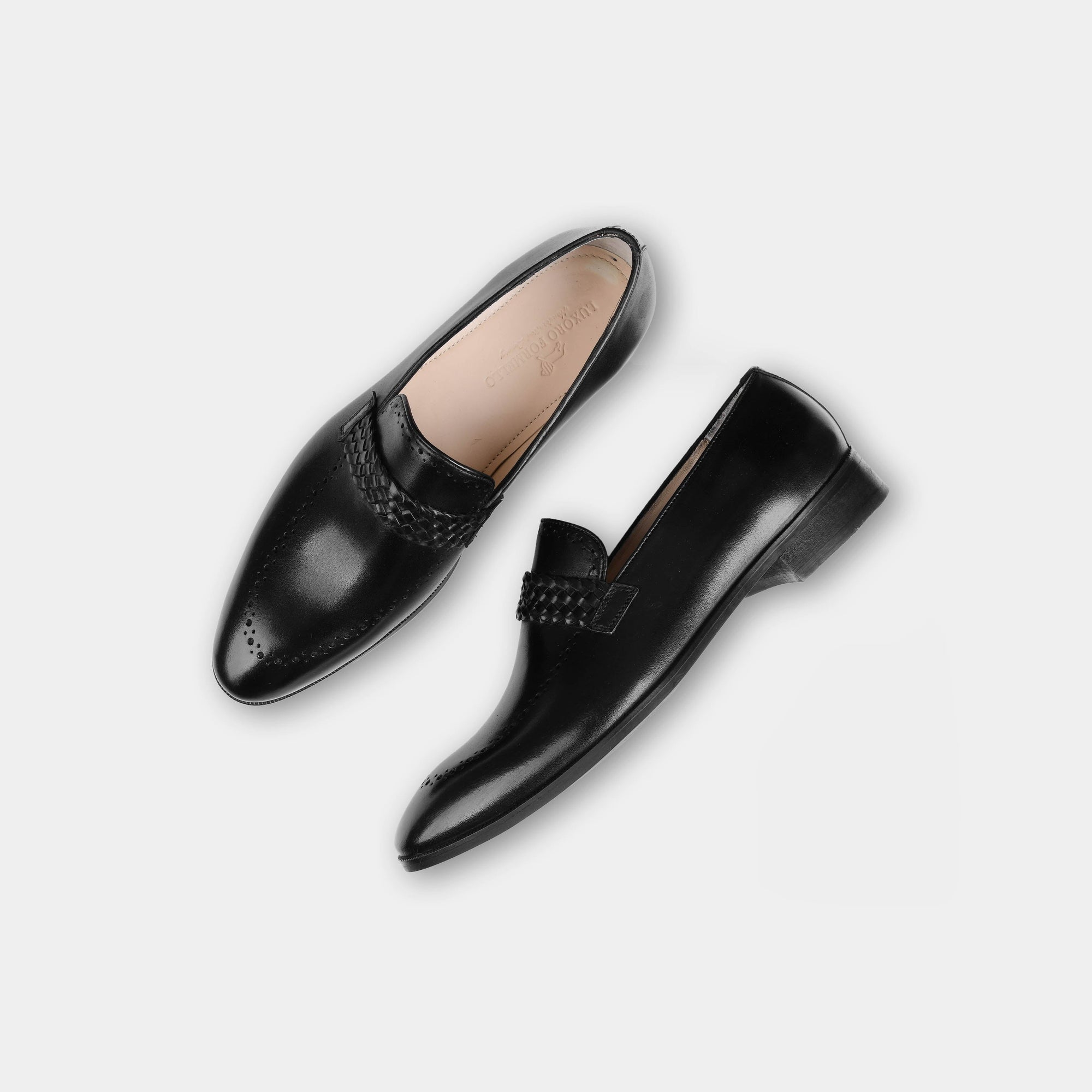 Pair of Alford Black Leather Loafers, featuring a woven strap detail and subtle broguing on the toe.